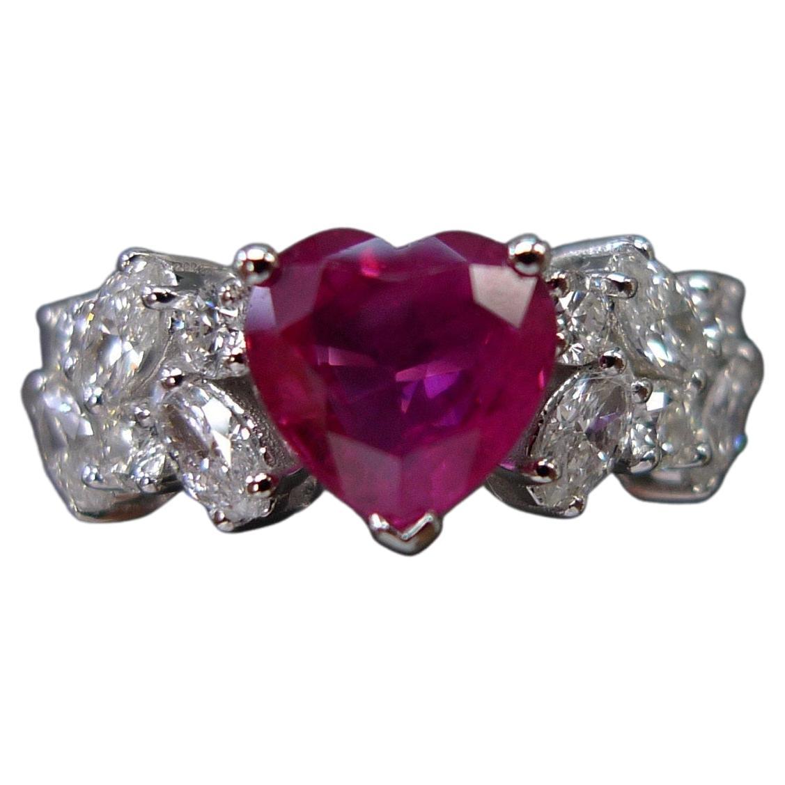 For Sale:  Heart Shaped Ruby Ring with Marquise Diamond Accents in 18k white gold