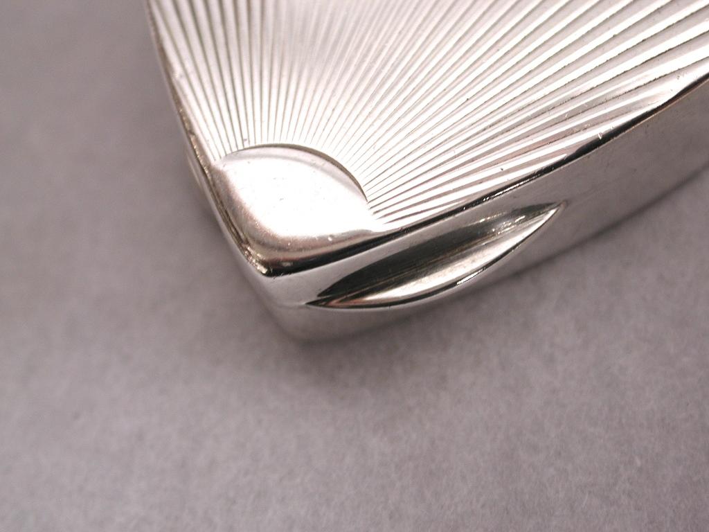 Heart shaped Tiffany & Co. pill box, circa 1980, made for Italian Market
Lovely sunburst pattern on front with 2 side grips for opening.
925 sterling silver.