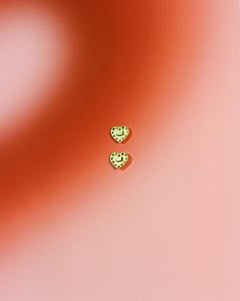Heart shaped white Gold adjustable Earrings.
