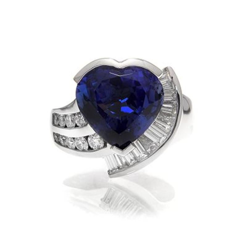 18k White Gold 9.21ct Heart Tanzanite Ring with 1.17ct Diamonds 

The finest quality Tanzanite, mined from the foothills of Mount
Kilimanjaro, exhibits a rich purplish blue. Takat uses only the best
examples of this hue to take center stage in each