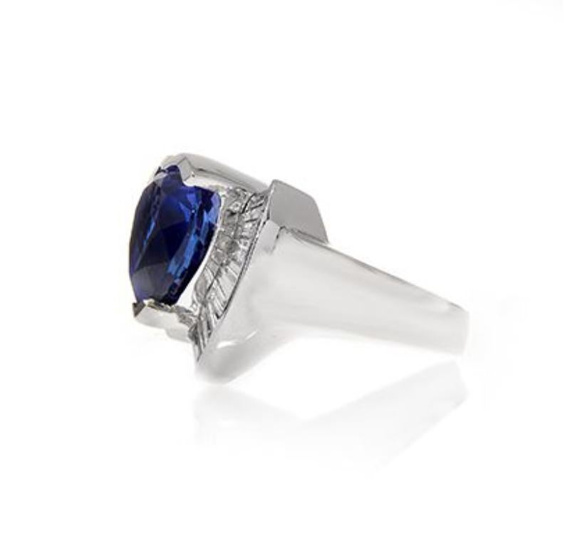 Modern 18k White Gold 9.21ct Heart Tanzanite Ring with 1.17ct Diamonds  For Sale