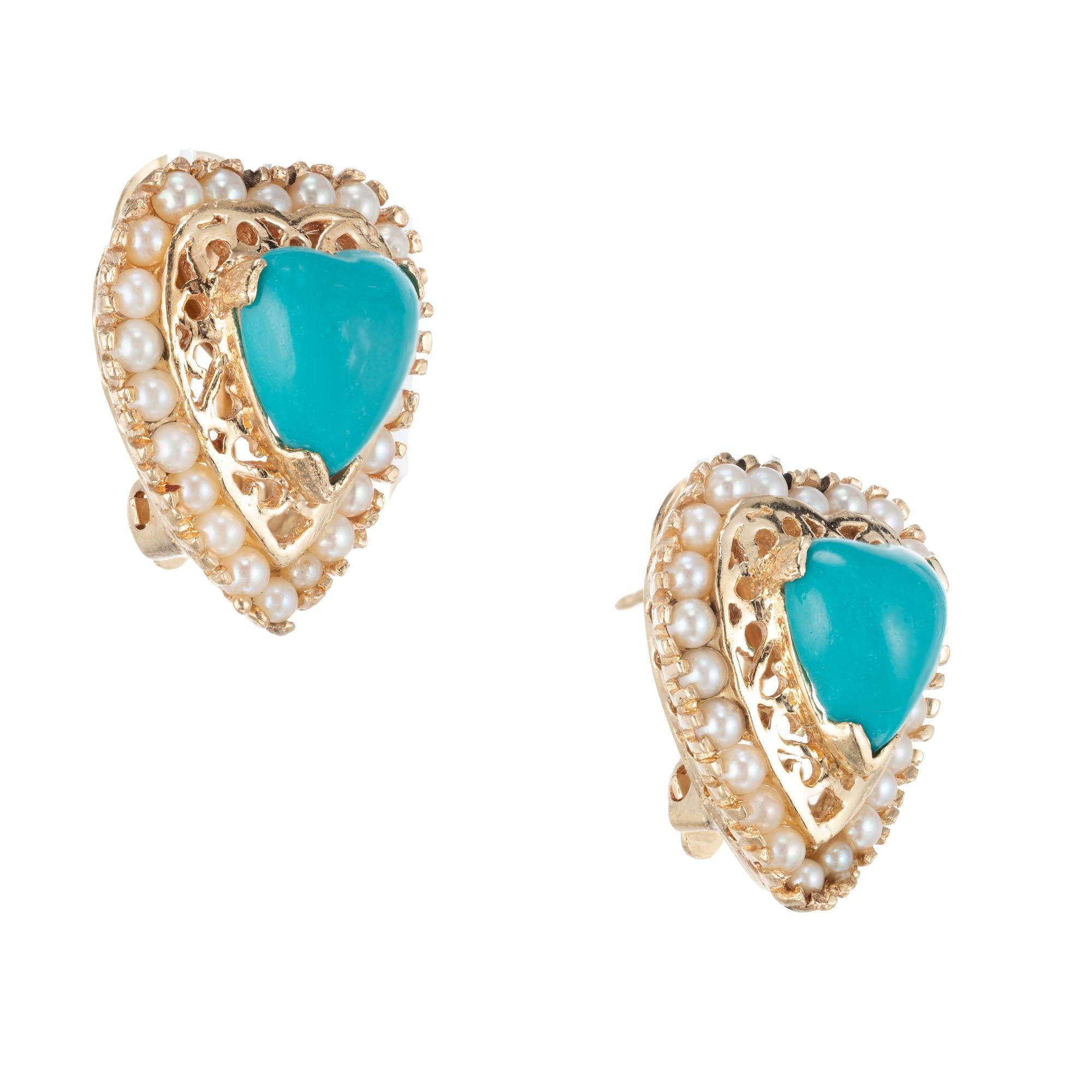 Mid- Century Heart shaped Turquoise clip post earrings with a halo of round cultured pearls. 1950’s open work 14k yellow design setting. 

 48 2mm cultured pearls
 Turquoise 10 x 9.5mm
 14k yellow gold 
 12.8 grams
 

