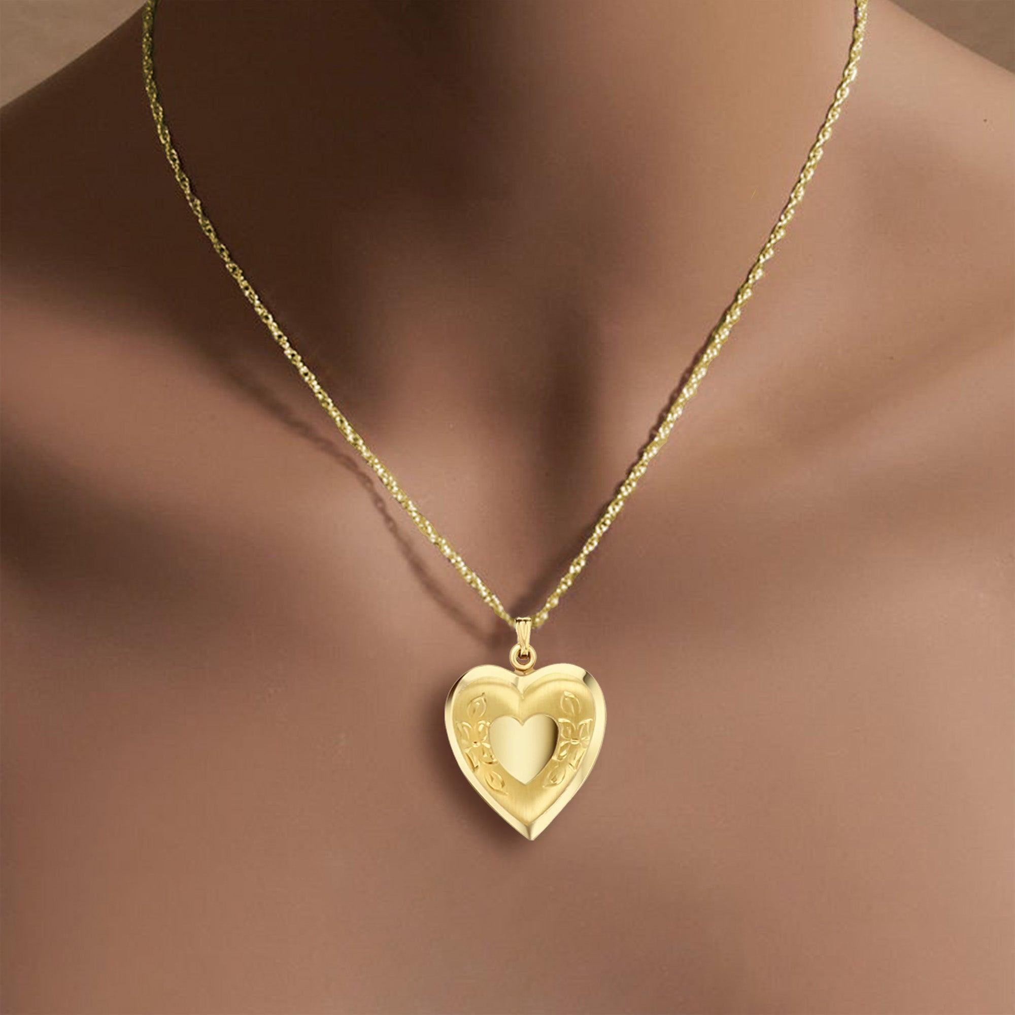 ♥ Produktübersicht ♥

Design: Herz im Herz mit Blumendesign und Diamantschliff
Wahl des Metalls: 14K Gelbgold
Gewicht: 4 Gramm
Abmessungen: 32mm x 23mm
Kette: 18