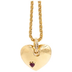 Hearth Pendant with Cabochon Ruby and Dial Bail
