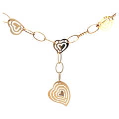 Collier pendentif cœurs et maillons en or jaune 14 carats