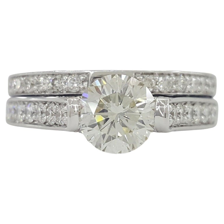 Hearts and Arrows Round Brilliant Cut Diamond Engagement Ring and