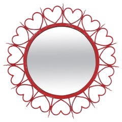 Miroir Sunburst encadré de cœurs