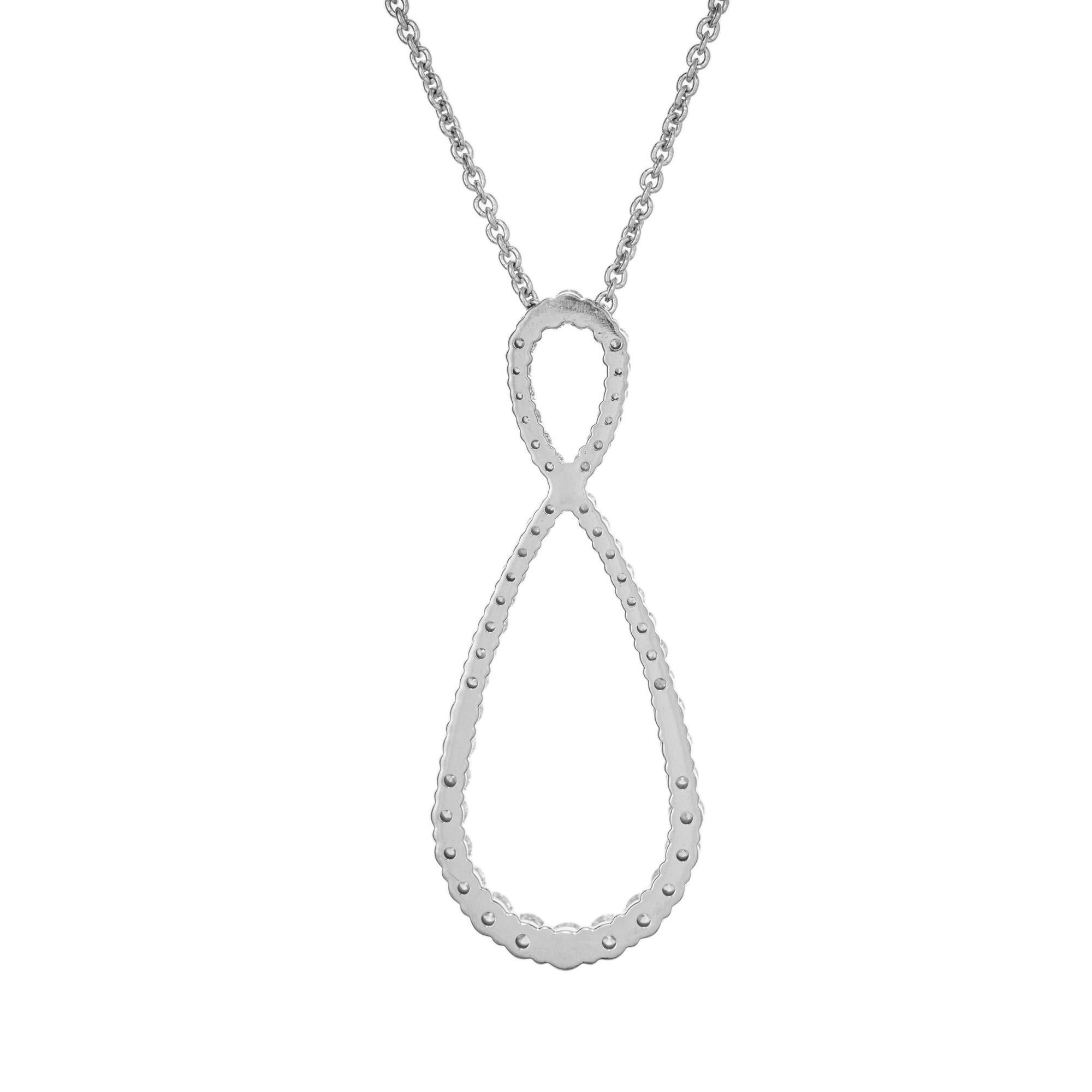 Hearts on Fire, sweeping swirl design diamond pendant necklace. 49 round diamonds totaling 1.35cts, set in 18k white gold swirl loop setting, with a 20 inch adjustable chain.

49 round HOF diamonds, G-H SI approx. 1.35cts
18k white gold 
Stamped:
