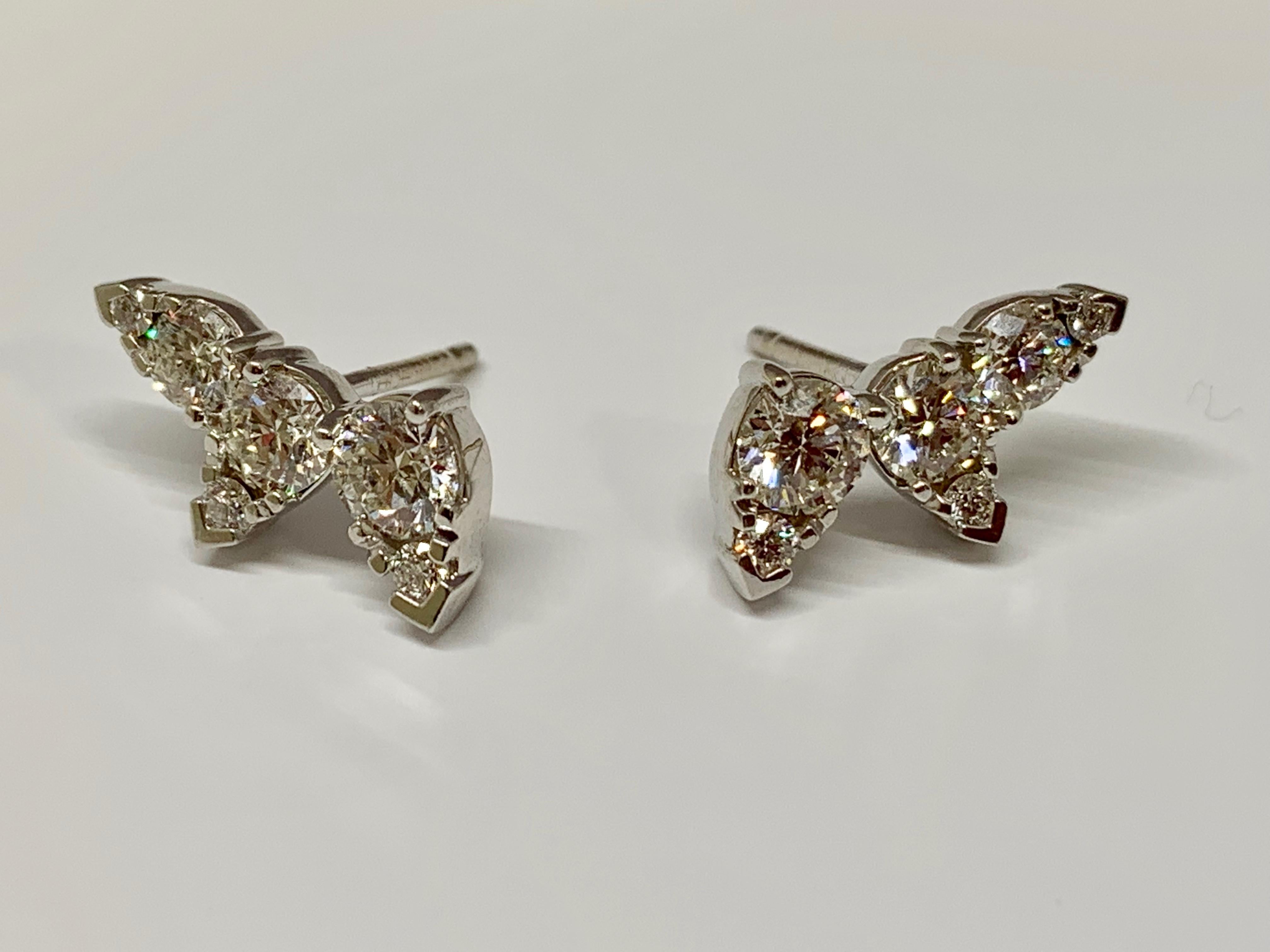 These stunning 18k white gold Hearts On Fire ear climbers are magnificent. The vine-like design holds a total of 1.49 carats of perfectly cut round diamonds. These earrings include heavy-duty tension backs for ultimate security during wear. These