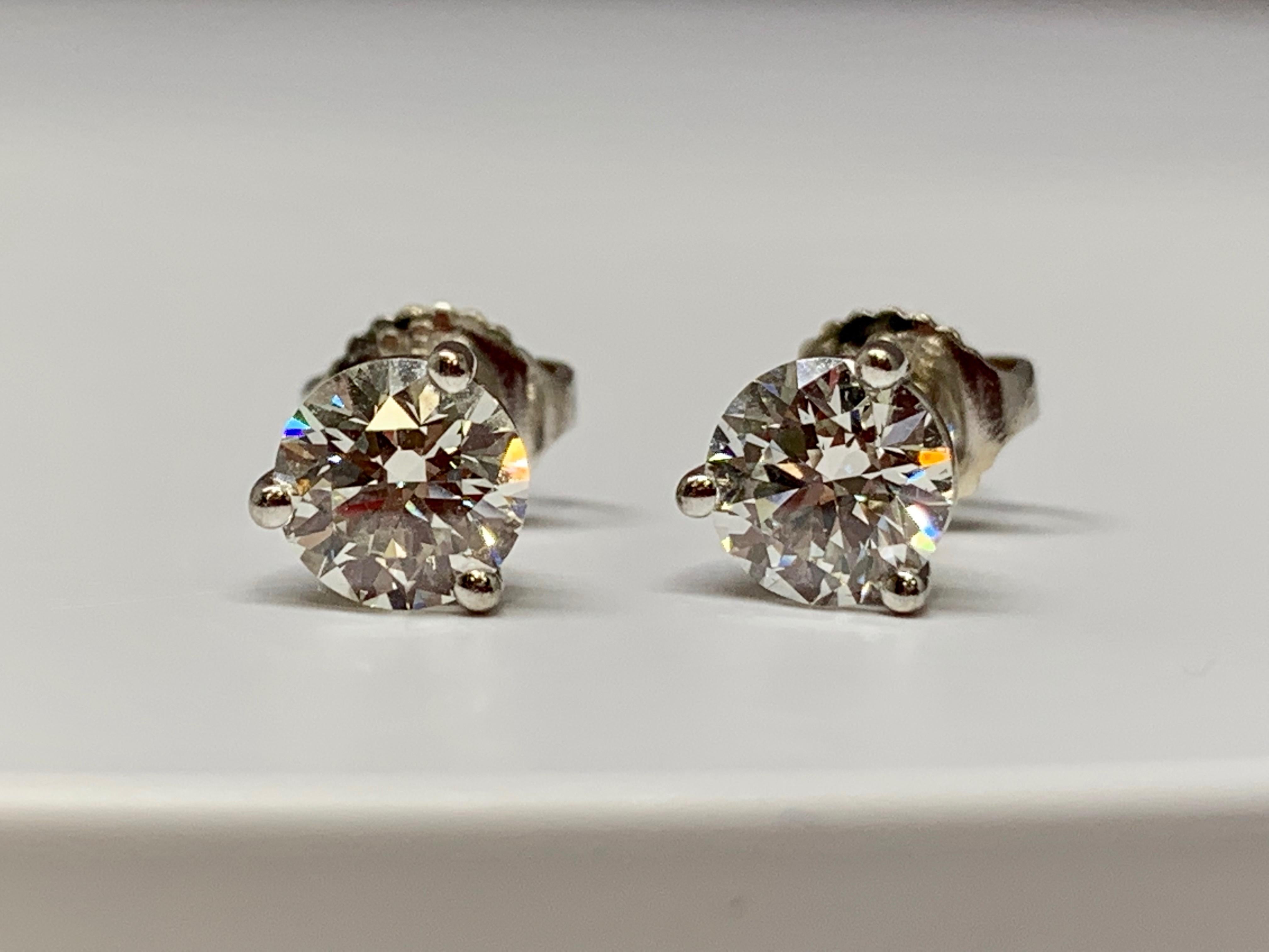Round Cut Hearts on Fire 18 Karat White Gold 1.50 Carat Total Weight Diamond Stud Earrings For Sale