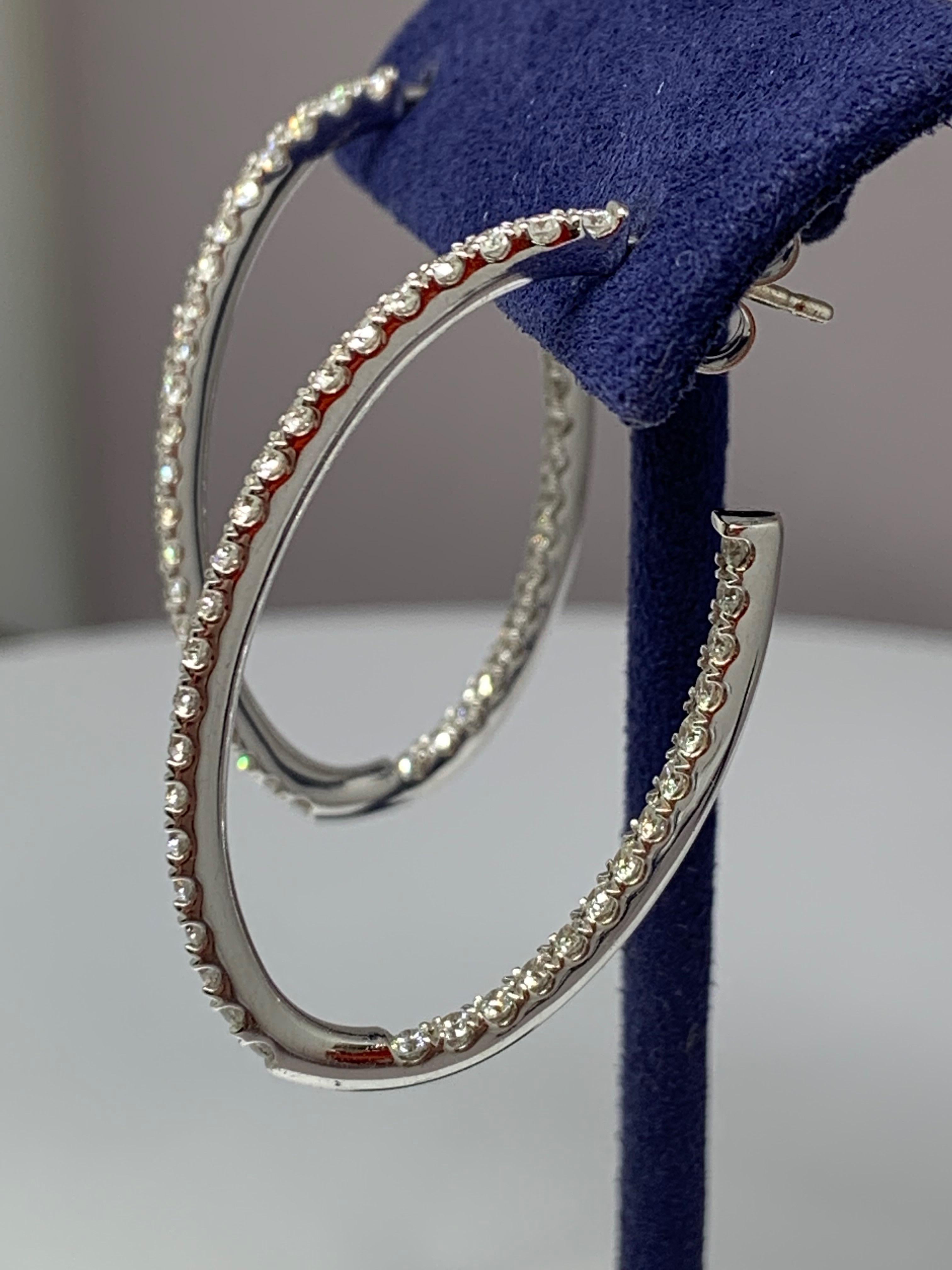 Contemporary Hearts on Fire 18 Karat White Gold 1.97 Carat Total Weight Diamond Hoop Earrings For Sale