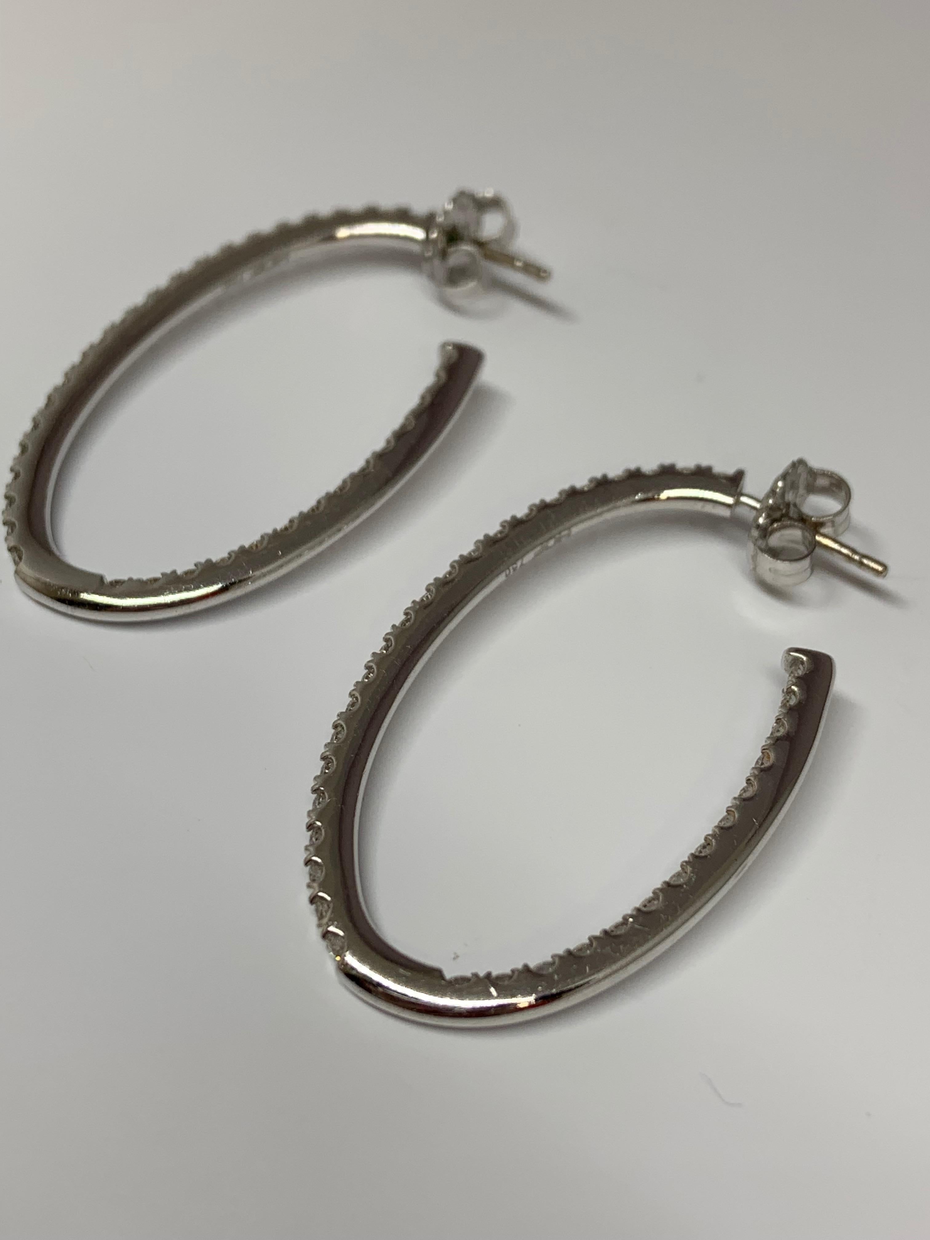 Round Cut Hearts on Fire 18 Karat White Gold 1.97 Carat Total Weight Diamond Hoop Earrings For Sale
