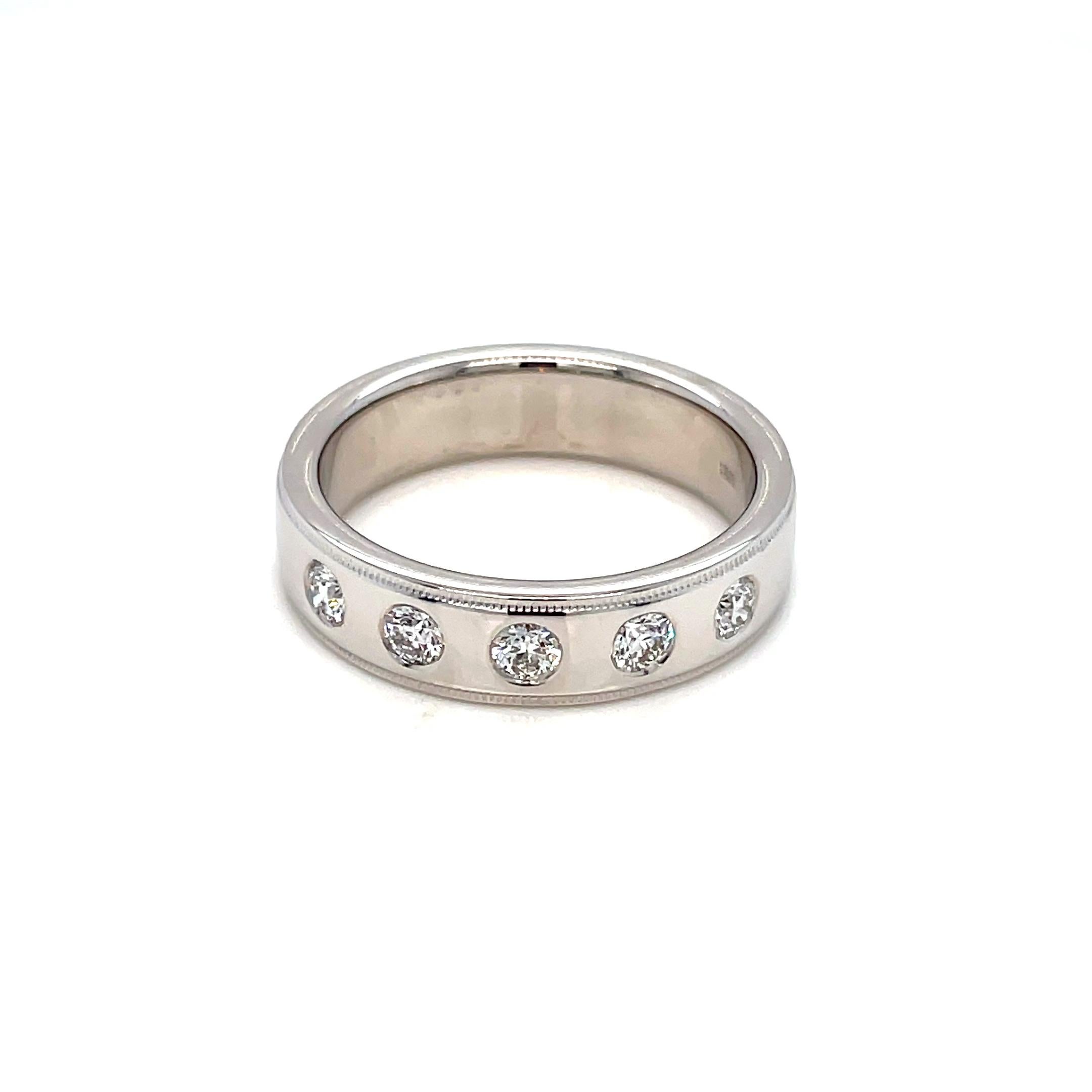 Hearts on Fire Diamond Band 18K White Gold
Size 9.75
11.58 Grams