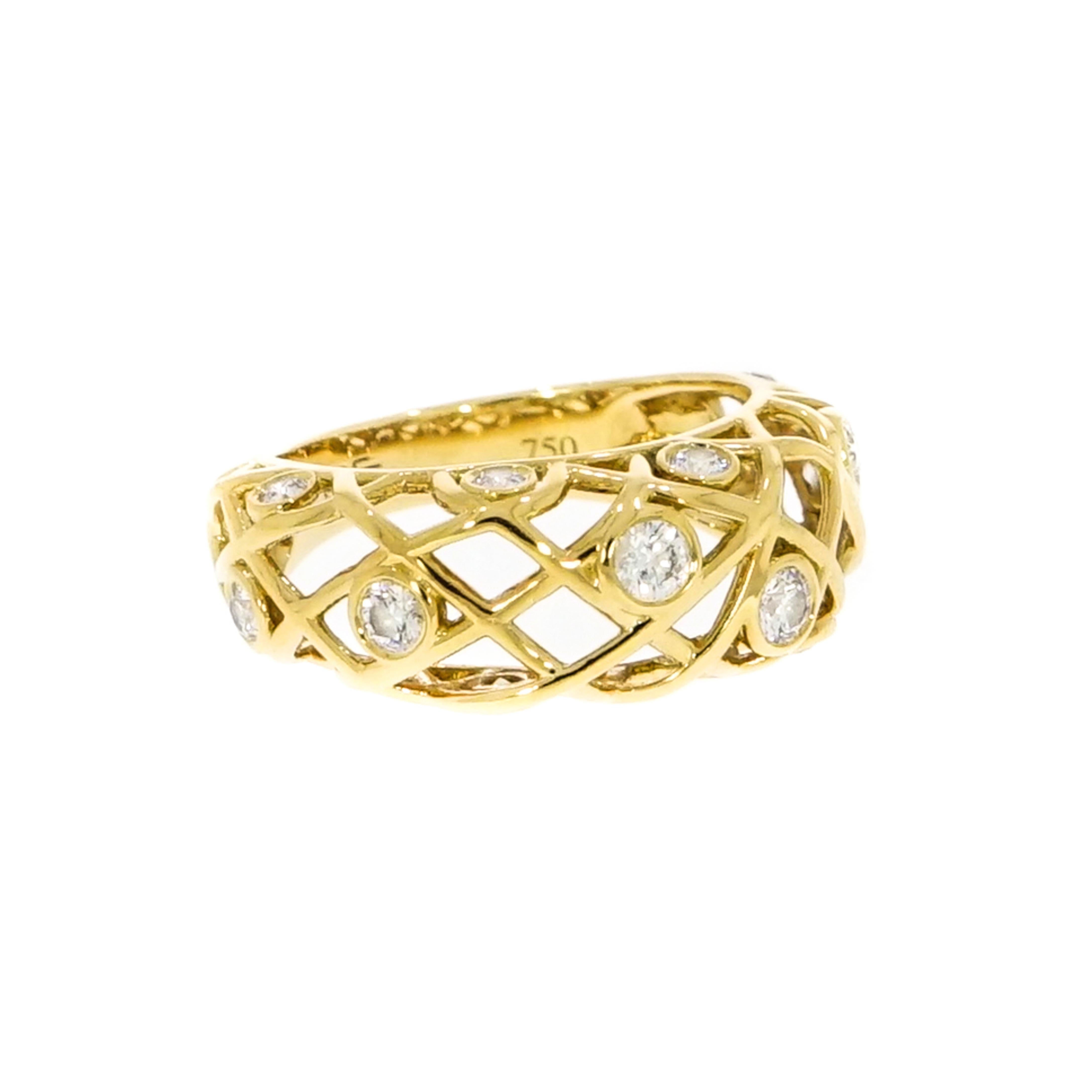 Hearts On Fire Diamond band, this is a beautiful ring crafted in 18k yellow gold and designed with bezel set diamonds. A ring of exceptional beauty that will make any woman stand out, the Brocade Diamond Right Hand Ring effortlessly captures the