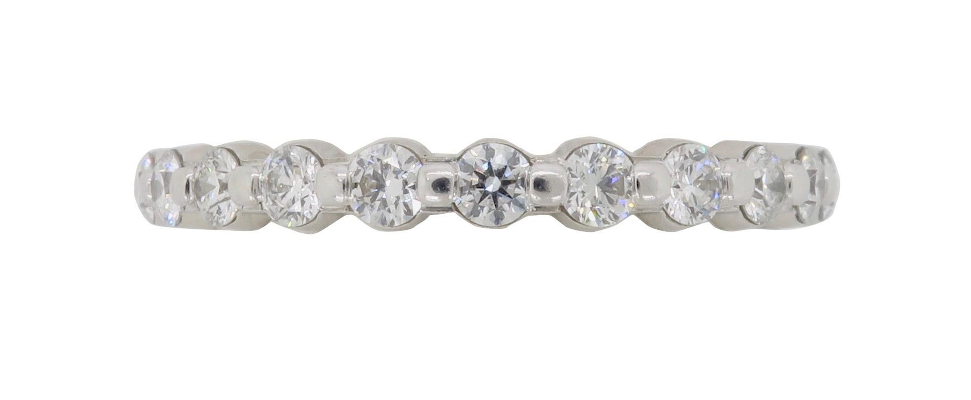 Hearts on Fire Diamond Eternity Band featuring .85ctw of Round Cut Diamonds.
Diamond Carat Weight: Approximately .85 CTW
Diamond Cut: Hearts on Fire Round Cut Diamonds
Color: Average  G-I
Clarity: Average VS1-SI1
Metal: 18K White Gold
Marked/Tested: