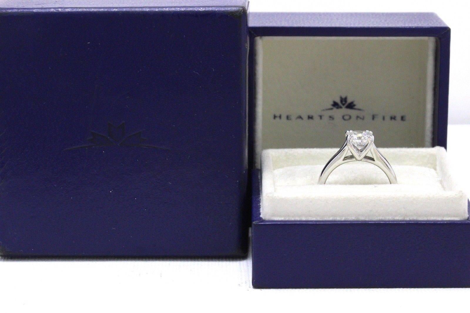 HEARTS ON FIRE DREAM CUT DIAMOND ENGAGEMENT RING
Style:  Solitaire
Serial Number:  AGS 0005312810
Metal:  18KT White Gold
Size:  5.25 - Sizable
Total Carat Weight:  1.130 TCW
Diamond Shape:  Cut Corner Square Brilliant - Dream Cut
Diamond Color &