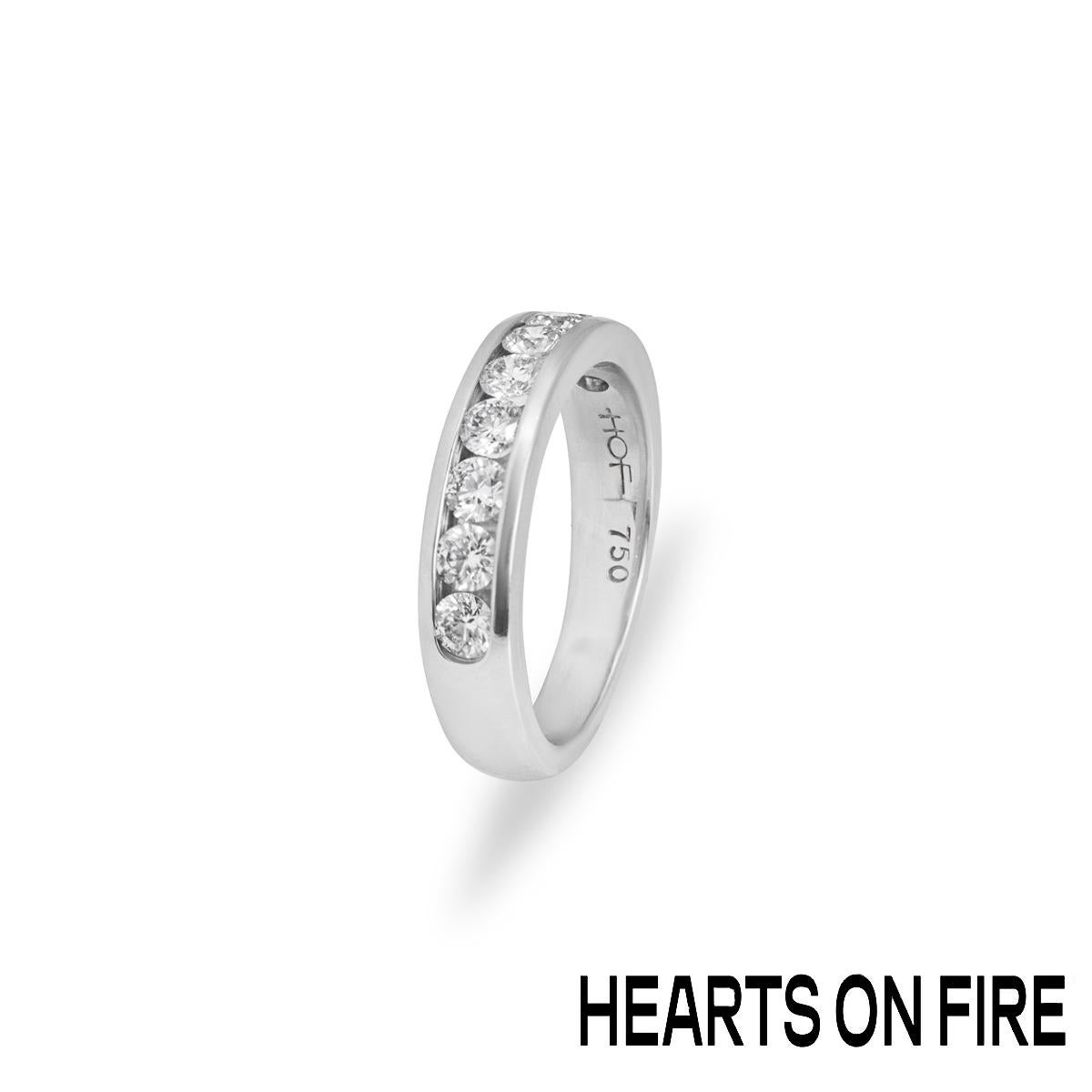 A stunning 18k white gold diamond half eternity ring by Hearts on Fire. The wedding band is channel set with 9 round brilliant cut diamonds with an approximate total weight of 0.73ct, G-H colour and VS clarity. The 4.3mm ring has a gross weight of