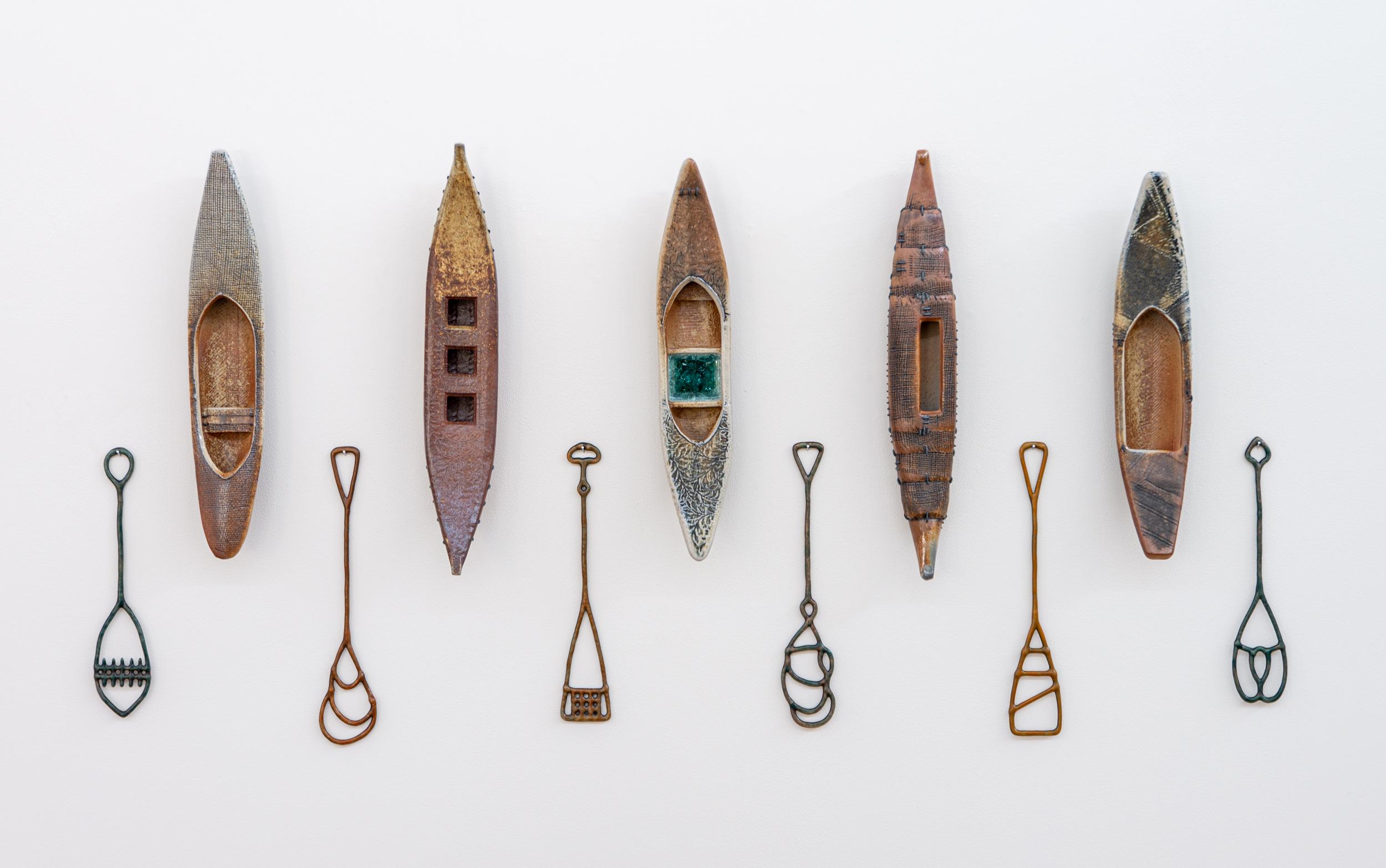 Exploring - contemporary, figurative, hand-crafted, ceramic wall sculpture