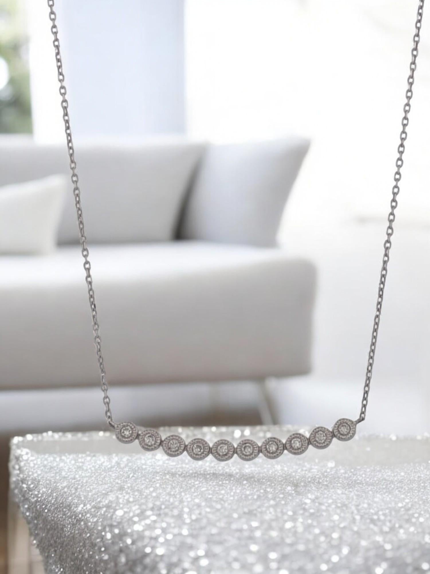 Elegant simplicity never goes out of style—and Heather is proof. ✨ This dainty 10k white gold necklace is adorned with 0.17 carats of natural diamonds, offering a soft shimmer that catches the light with every movement.

Perfectly polished and