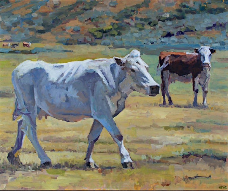 "Burning Mountain Cows" is an original oil painting on board by Heather Foster. The artist signed and dated the piece "HF 02" lower right. This painting depicts two cows in the foreground and more small cows in the background. 

30" x 36" art
35