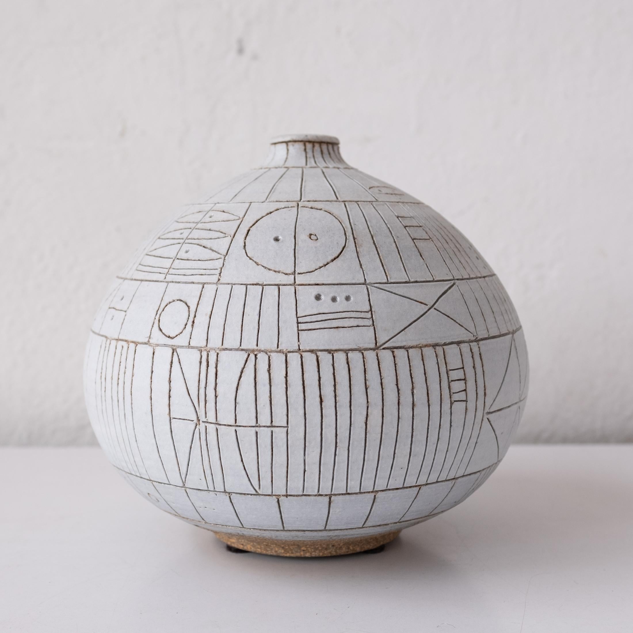 Vase by Heather Rosenman. Beautiful incised design on a perfectly thrown form. 

Bio: 
A New York native, currently based in Los Angeles, she studied at The Cooper Union and The Basel School of Design in Switzerland. Her collections are informed