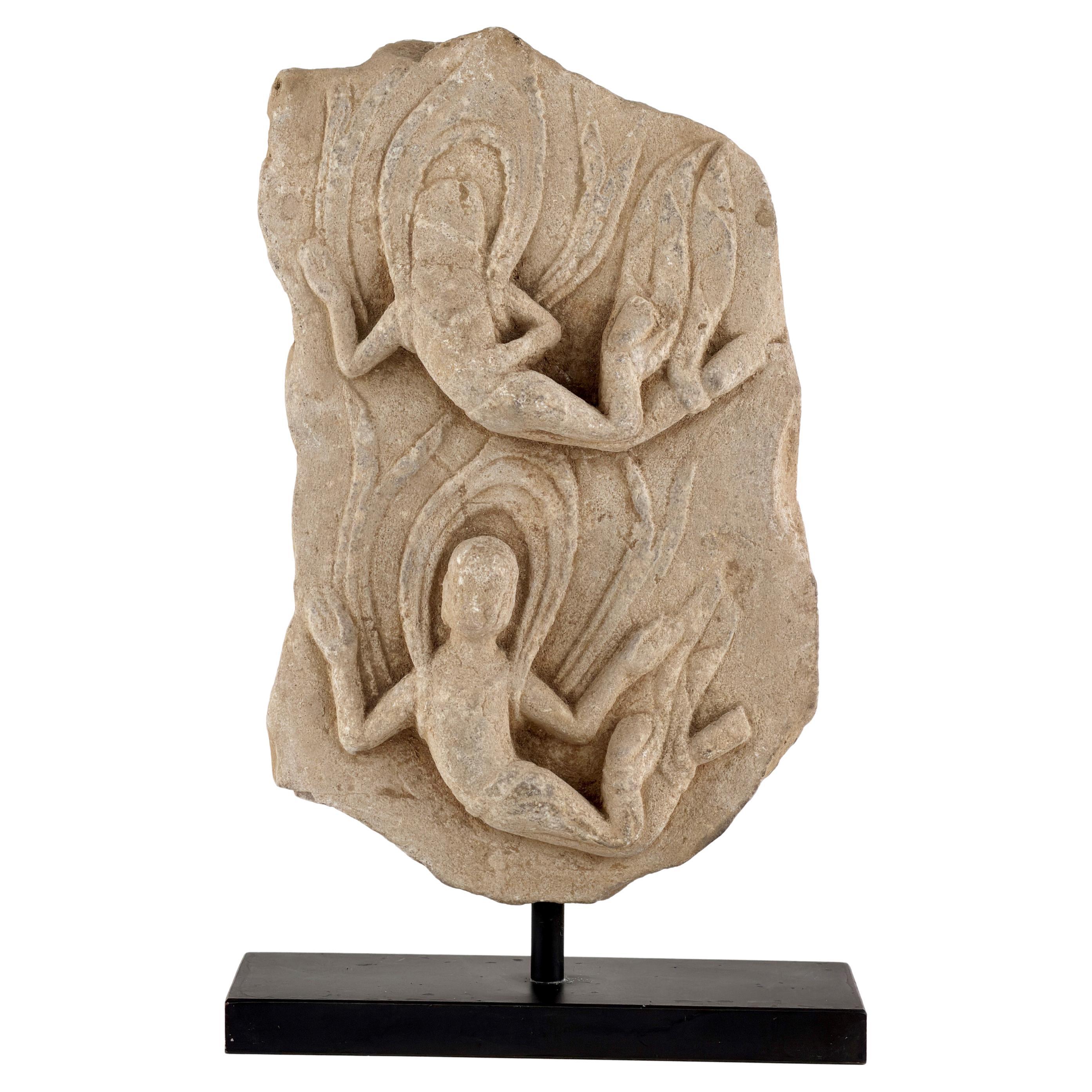 Seres celestiales Fragmento de estela de piedra caliza tallada, dinastía Wei Septentrional/Oriental