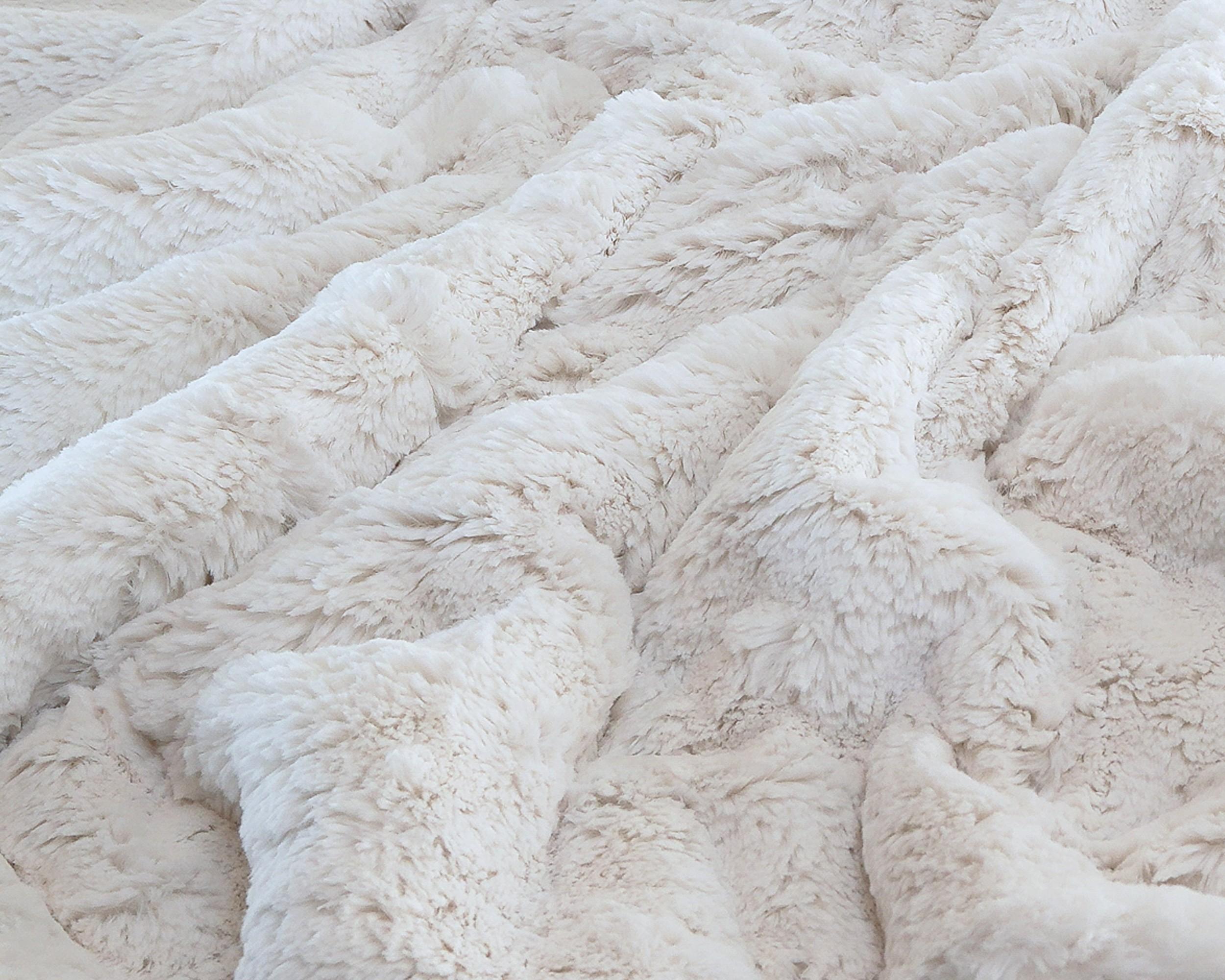 Pile Height ◼◼◼◼

A luxurious and substantial blanket inspired by the sun-kissed beaches and gentle waves of Hermosa Beach, California. This ultra-plush blanket invites you to sink in and stay awhile.  As you snuggle beneath its heavenly warmth, let