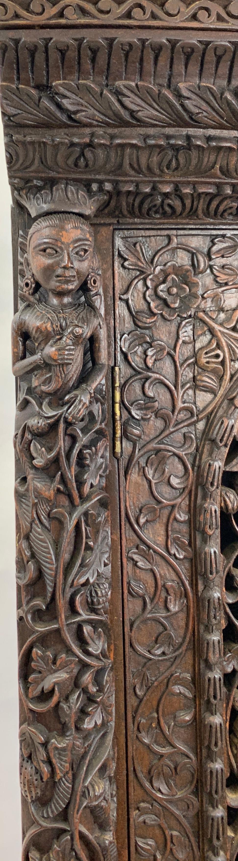 19th Century Heavily Carved Anglo Indian Corner Cabinet For Sale