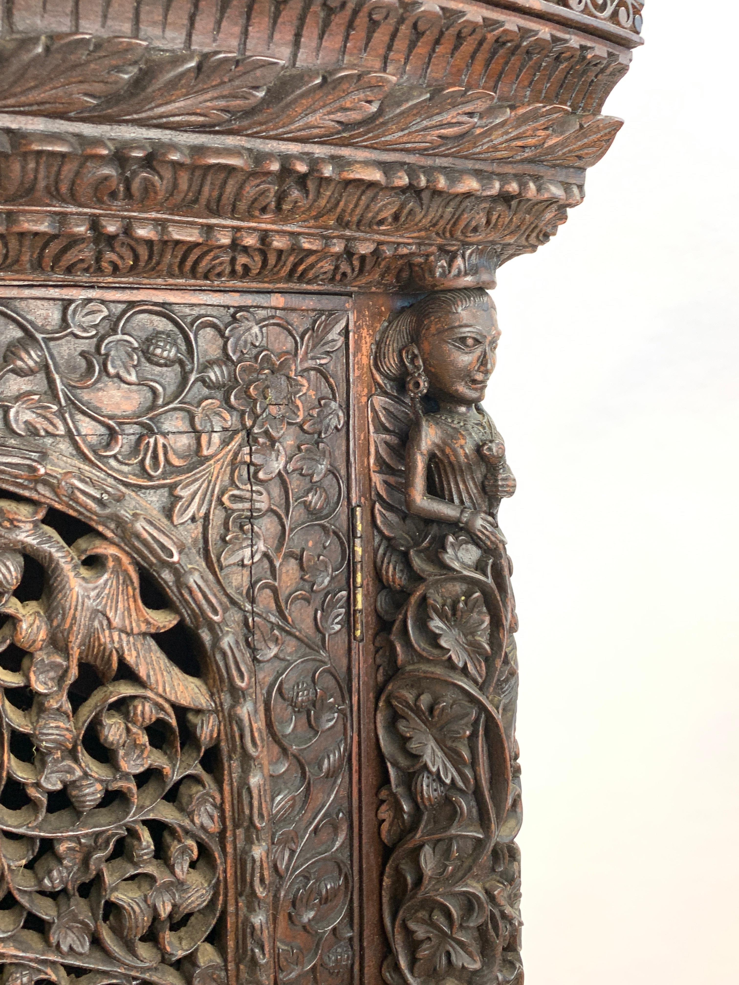 Heavily Carved Anglo Indian Corner Cabinet For Sale 4