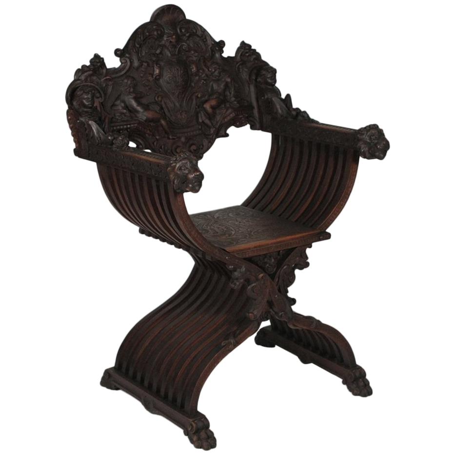 Heavily Carved Campaign Chair, circa 1890s