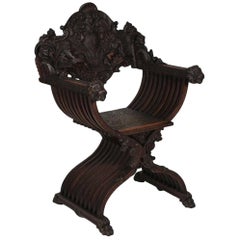 Heavily Carved Campaign Chair, circa 1890s