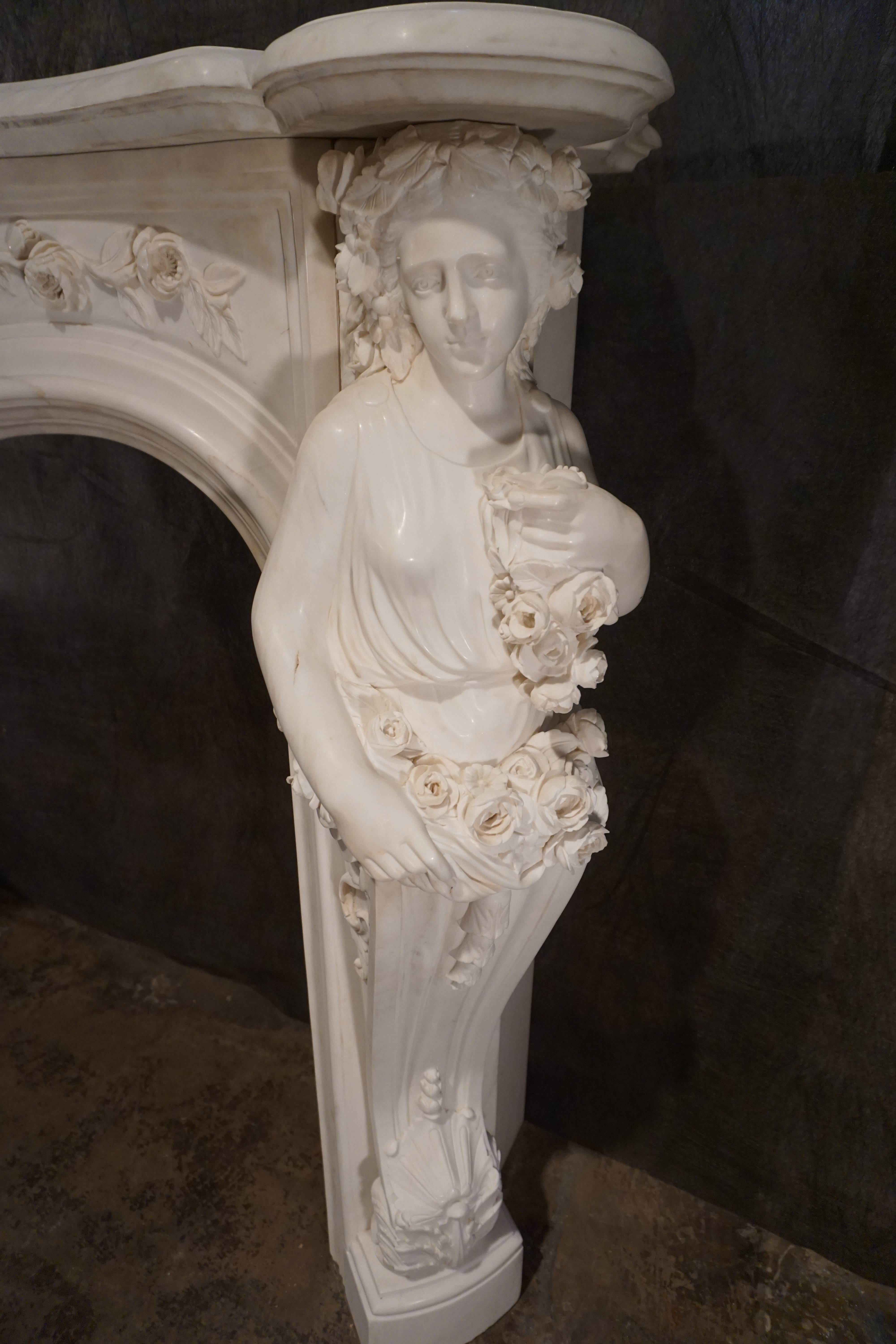 Italian Heavily Carved Carrera Marble Mantel with Caryatids of Summer and Autumn