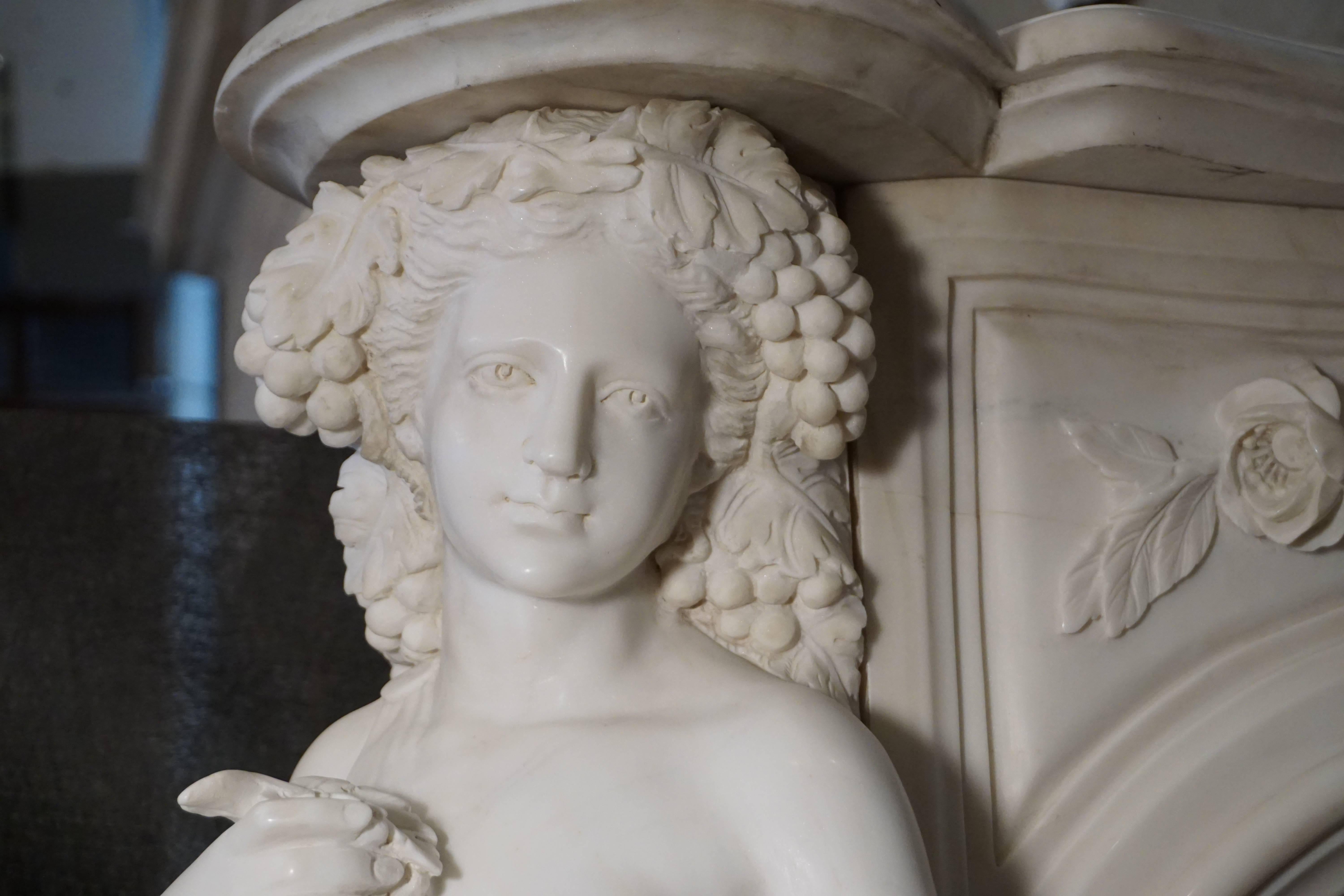 Hand-Carved Heavily Carved Carrera Marble Mantel with Caryatids of Summer and Autumn