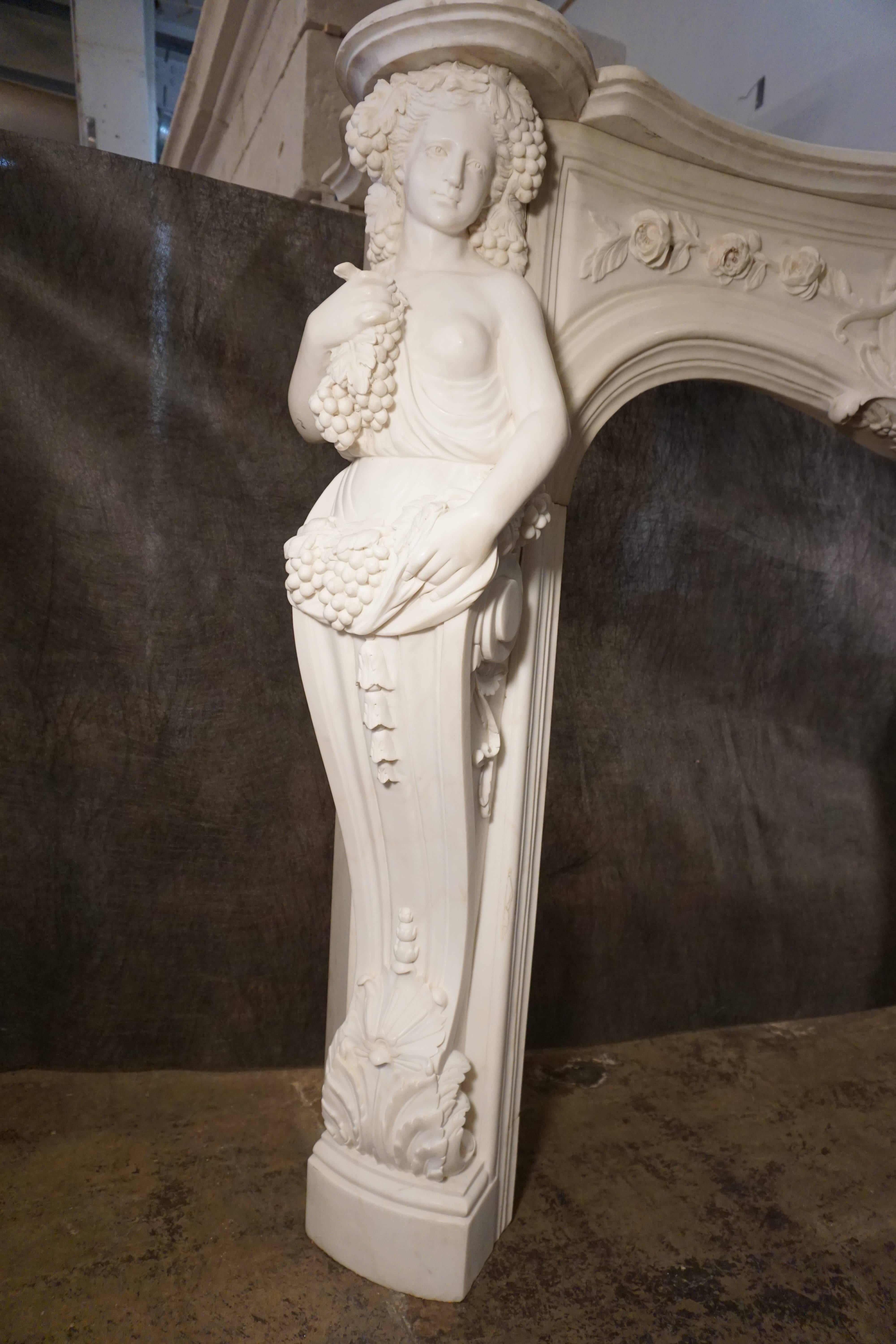 Heavily Carved Carrera Marble Mantel with Caryatids of Summer and Autumn In Excellent Condition In Dallas, TX