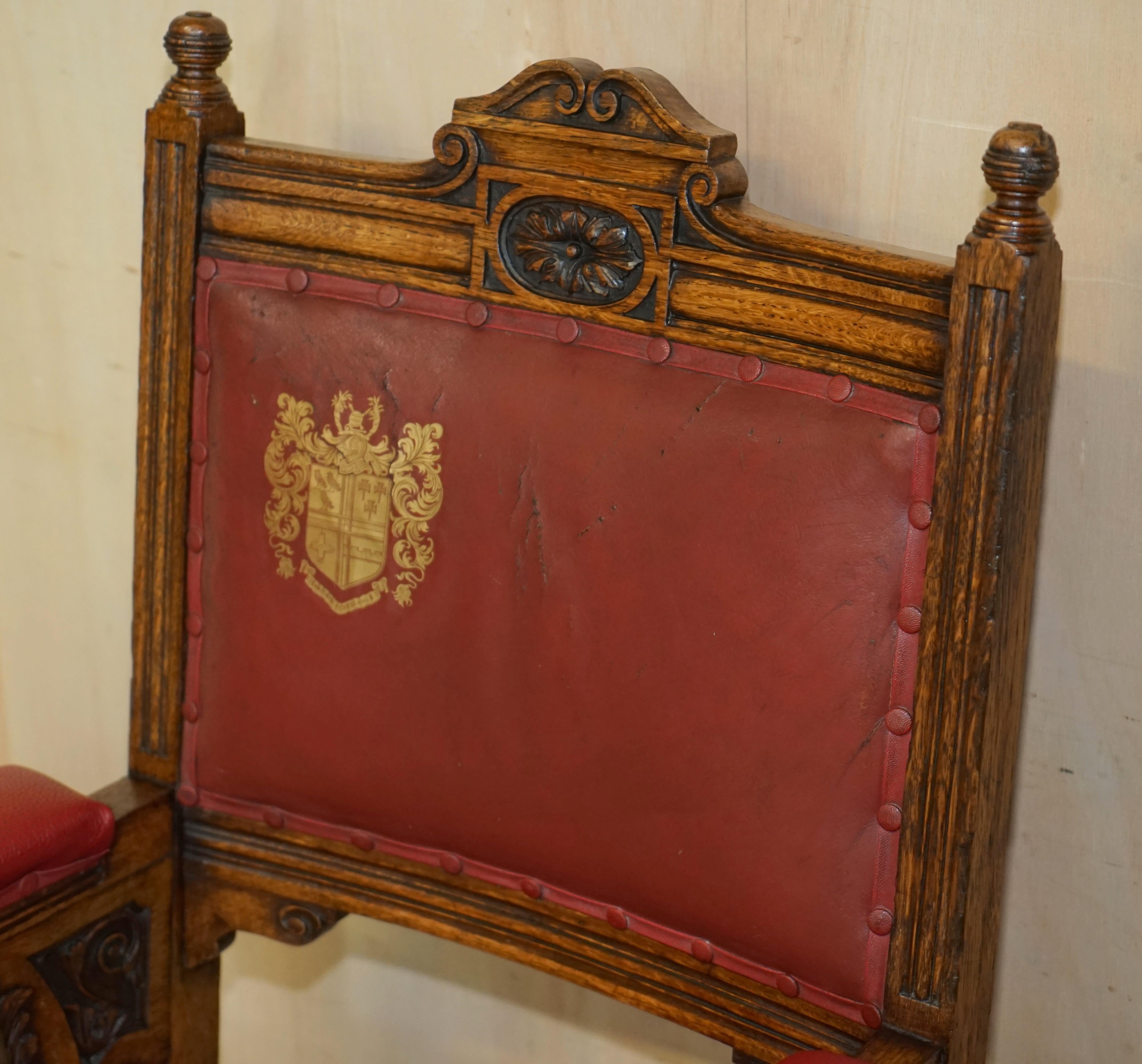 Hand-Crafted Heavily Carved English Antique Victorian Armchair + Coat of Arms Armorial Crest For Sale