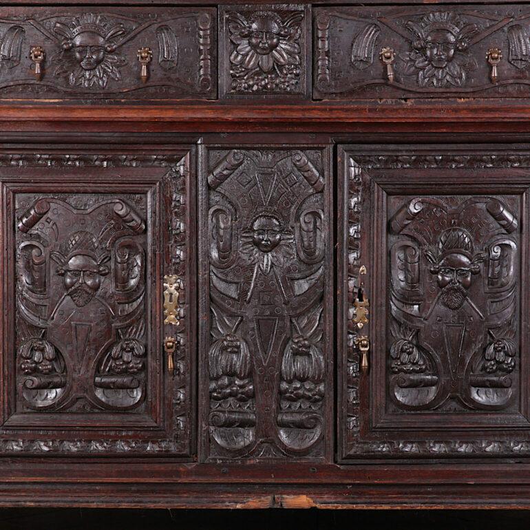 Heavily hand carved French Renaissance buffet hutch C.1600. Simple and naive carvings commensurate with that era of furniture making. Beautiful patina in remarkable original condition.
