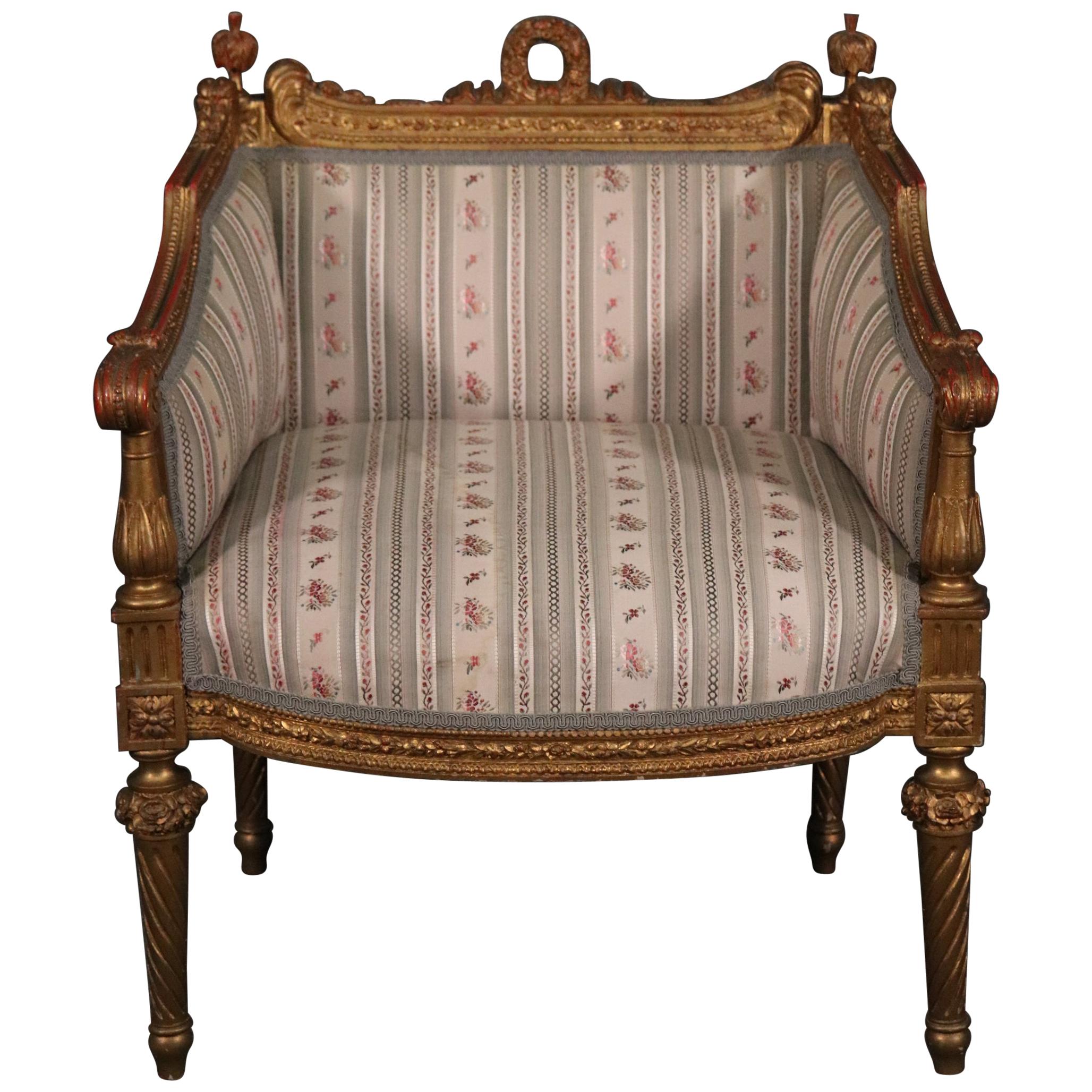Heavily Carved Gilded French Louis XVI Bergere Chair Circa 1890