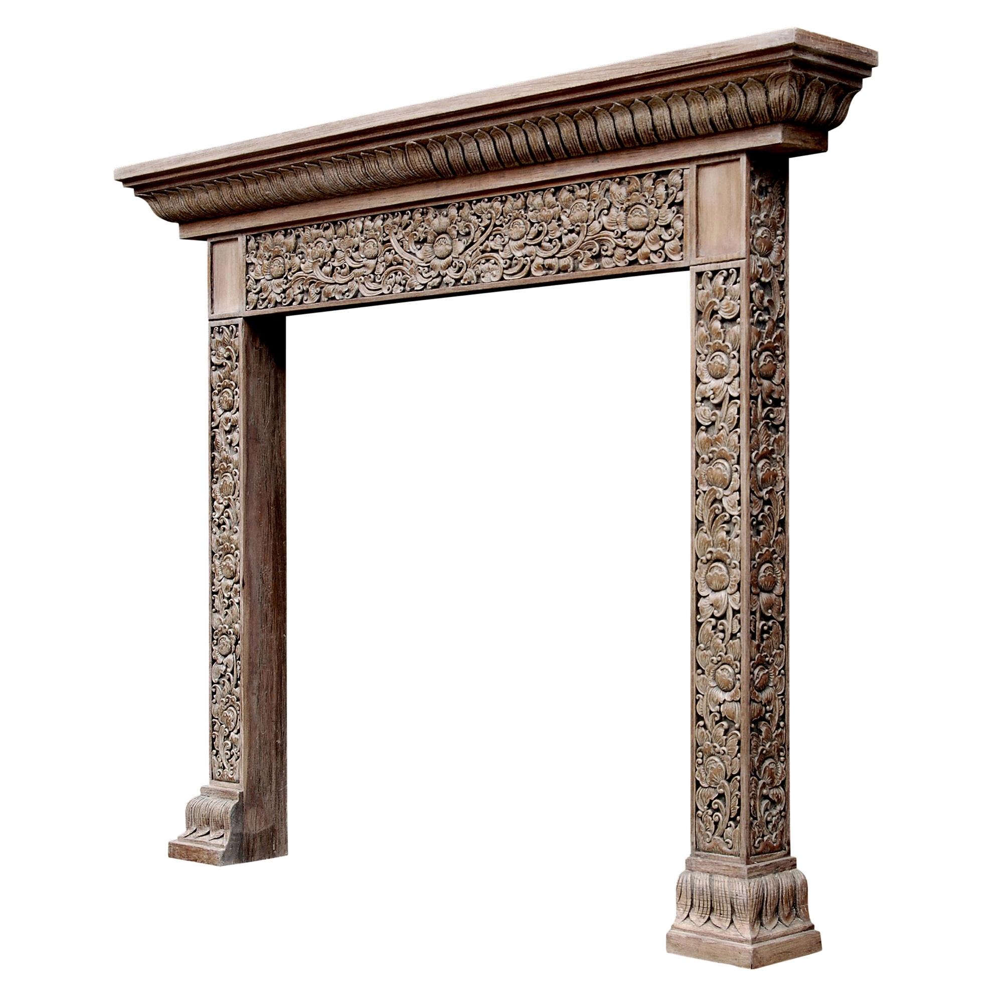 Heavily Carved Hardwood Fireplace with an Oriental Influence For Sale