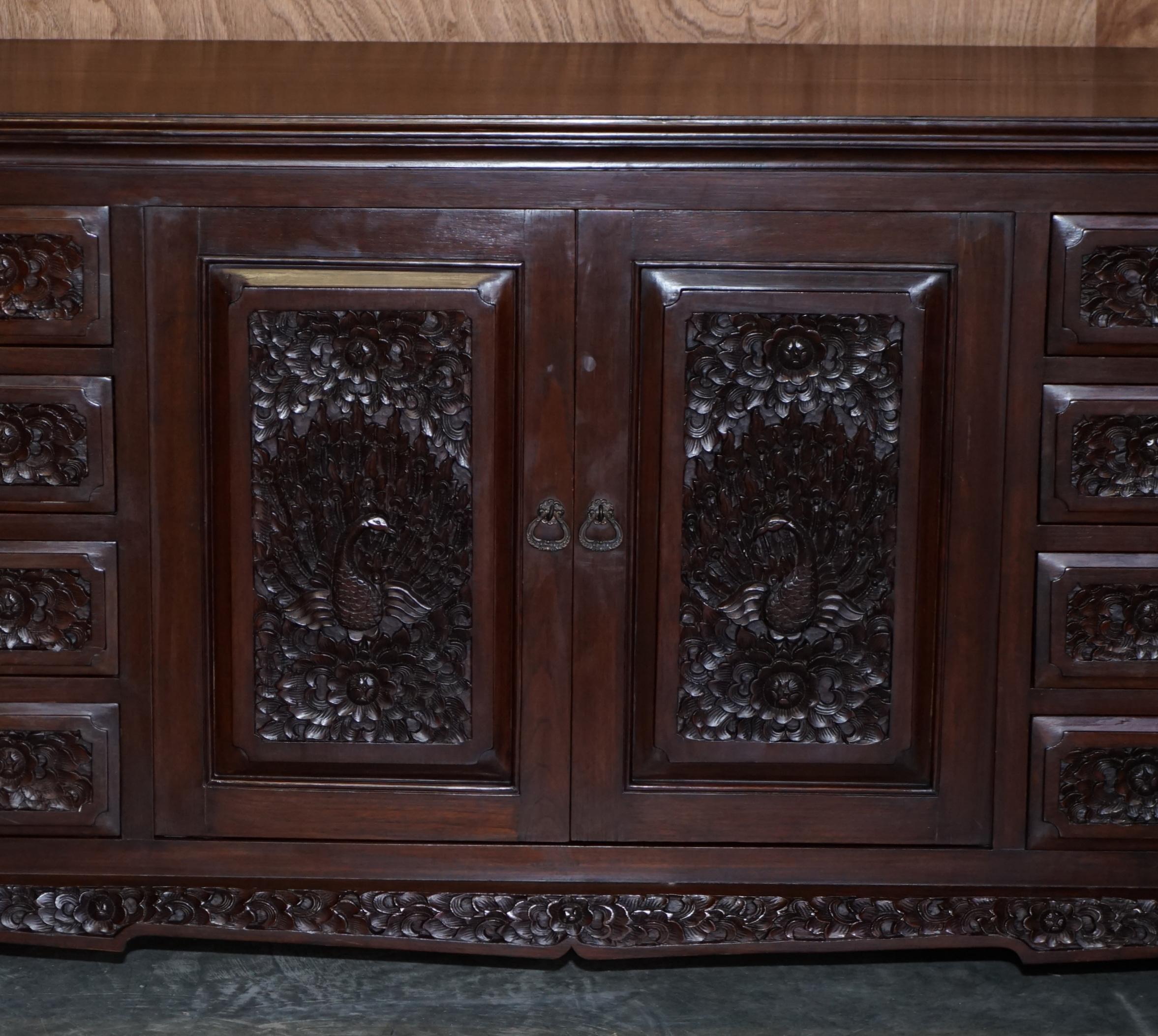 English Heavily Carved Large Indian Hardwood Sideboard with Flowers & Peacock Decortion For Sale