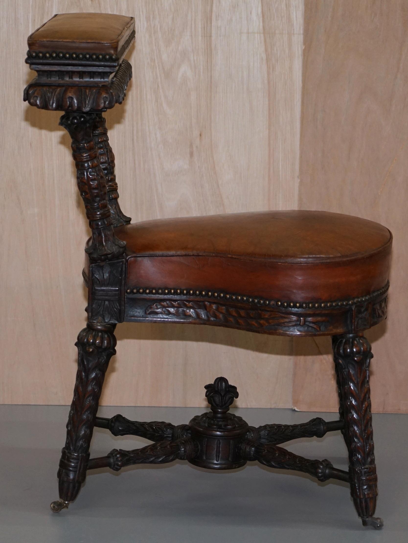 Heavily Carved Metamorphic Cock Fighting Chair circa 1850 Brown Leather Drawers 4