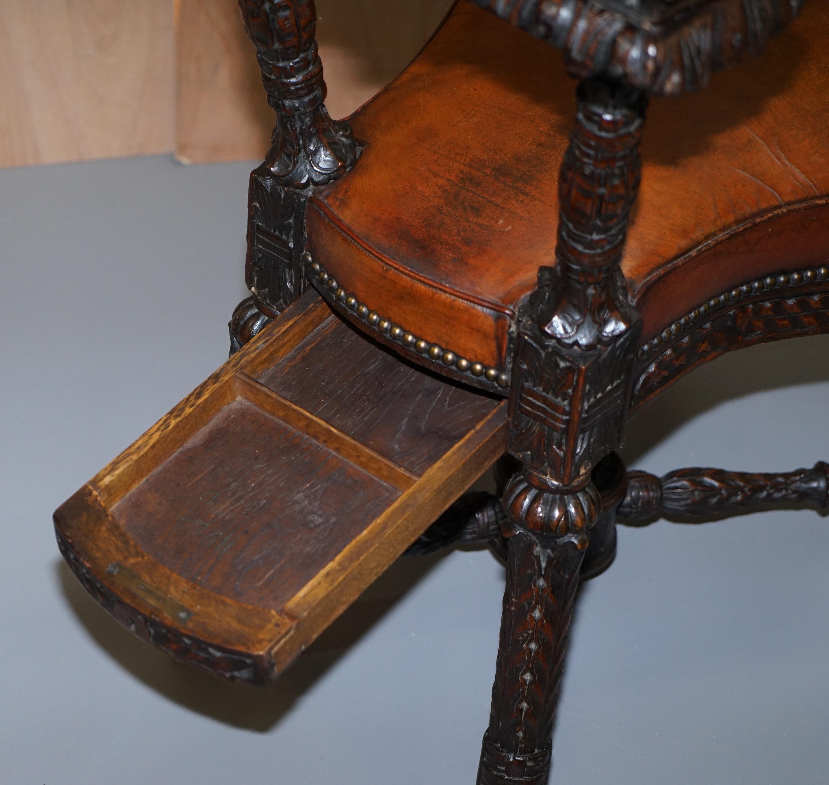 Heavily Carved Metamorphic Cock Fighting Chair circa 1850 Brown Leather Drawers 10