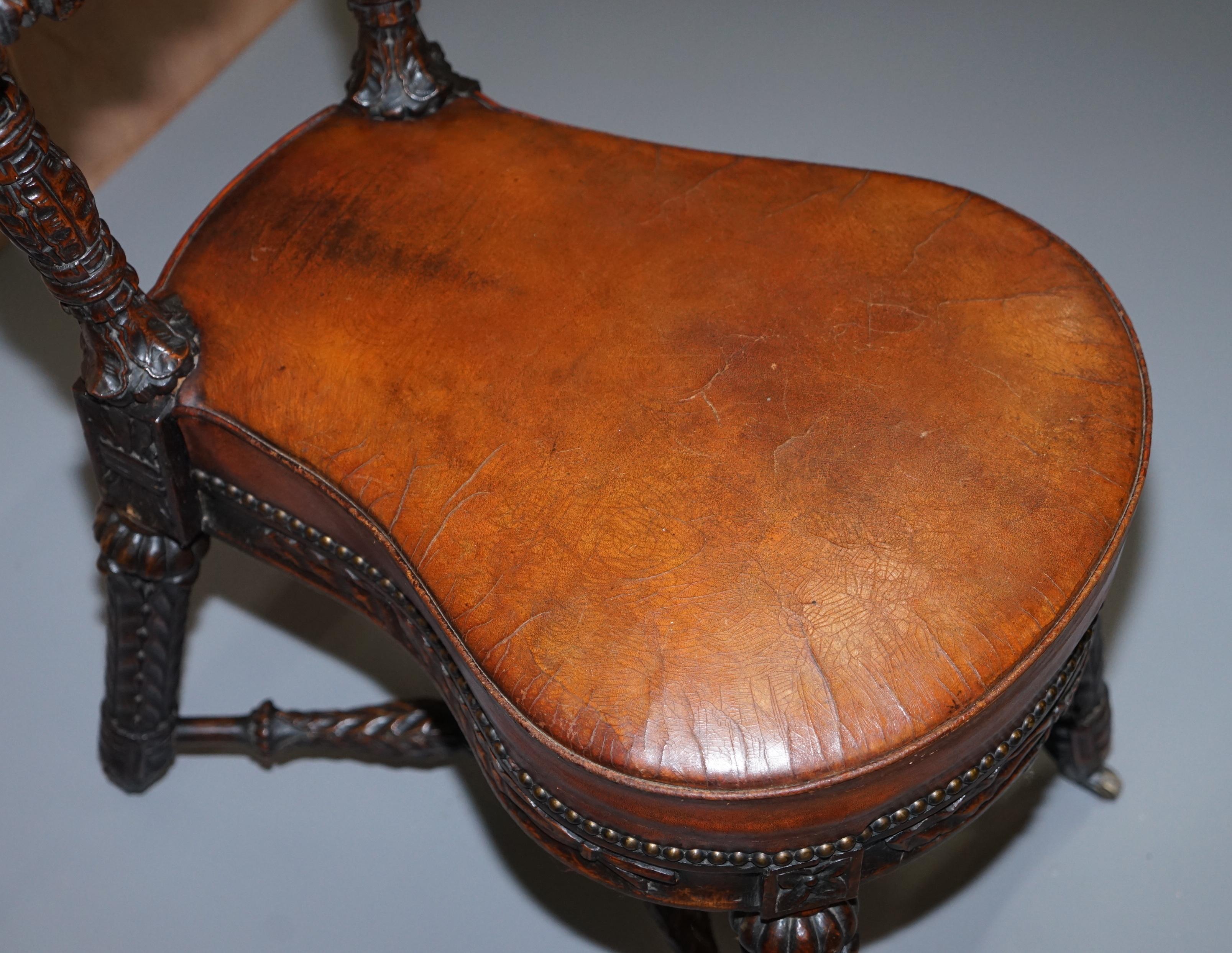 English Heavily Carved Metamorphic Cock Fighting Chair circa 1850 Brown Leather Drawers