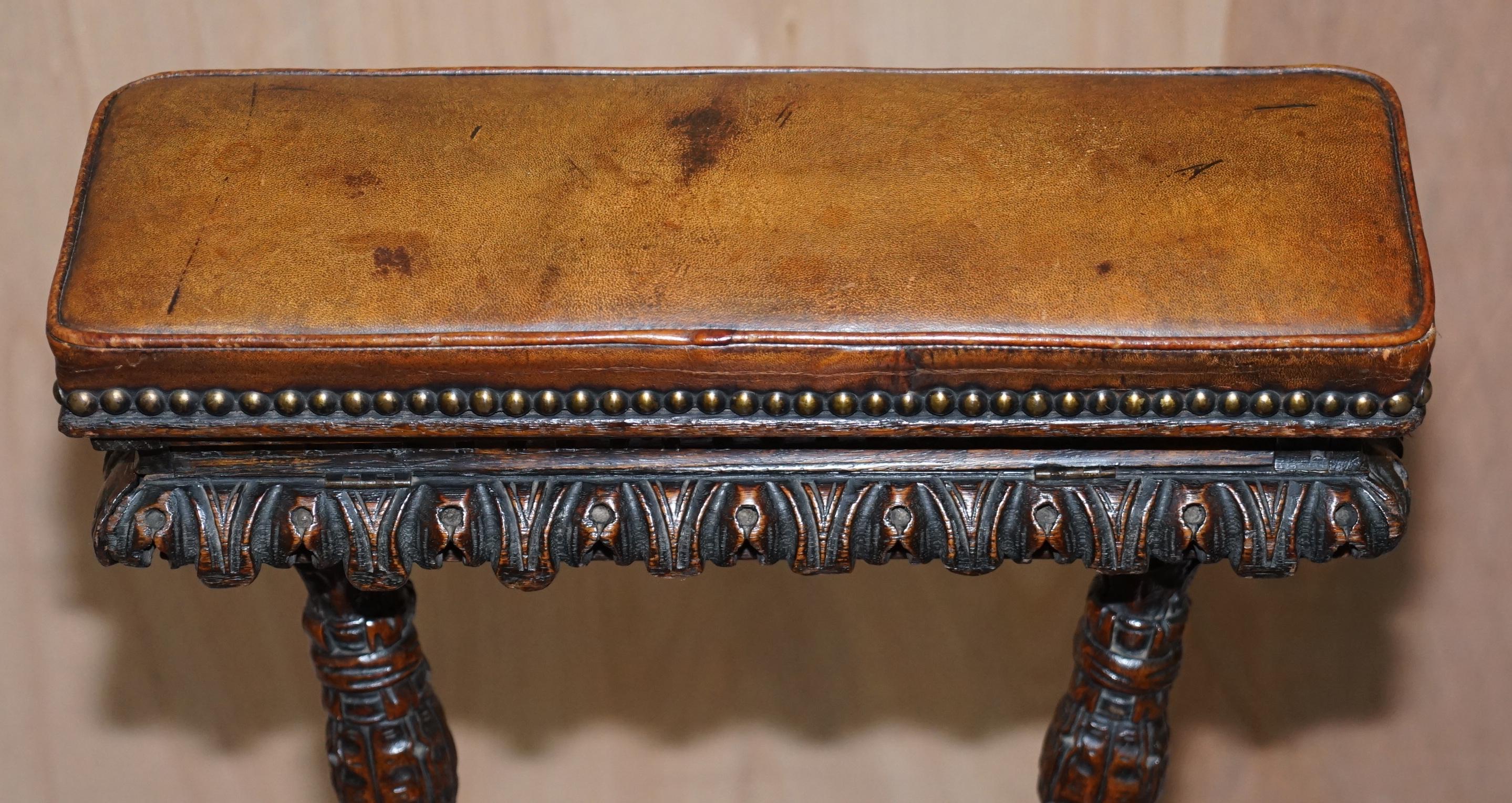 Hand-Crafted Heavily Carved Metamorphic Cock Fighting Chair circa 1850 Brown Leather Drawers
