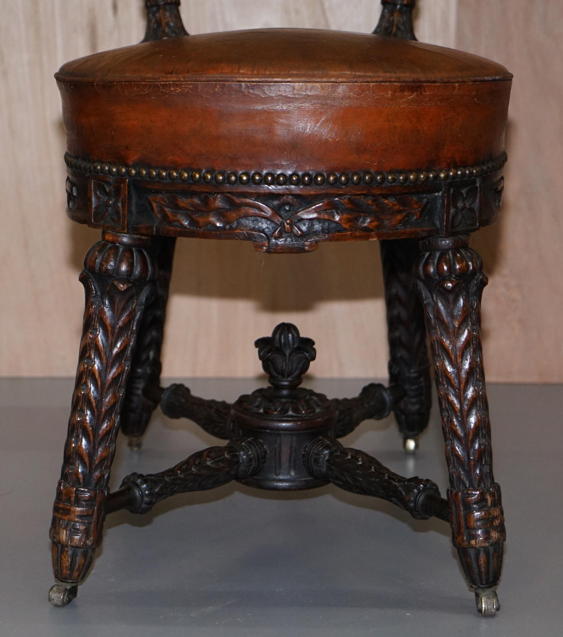 Heavily Carved Metamorphic Cock Fighting Chair circa 1850 Brown Leather Drawers 1