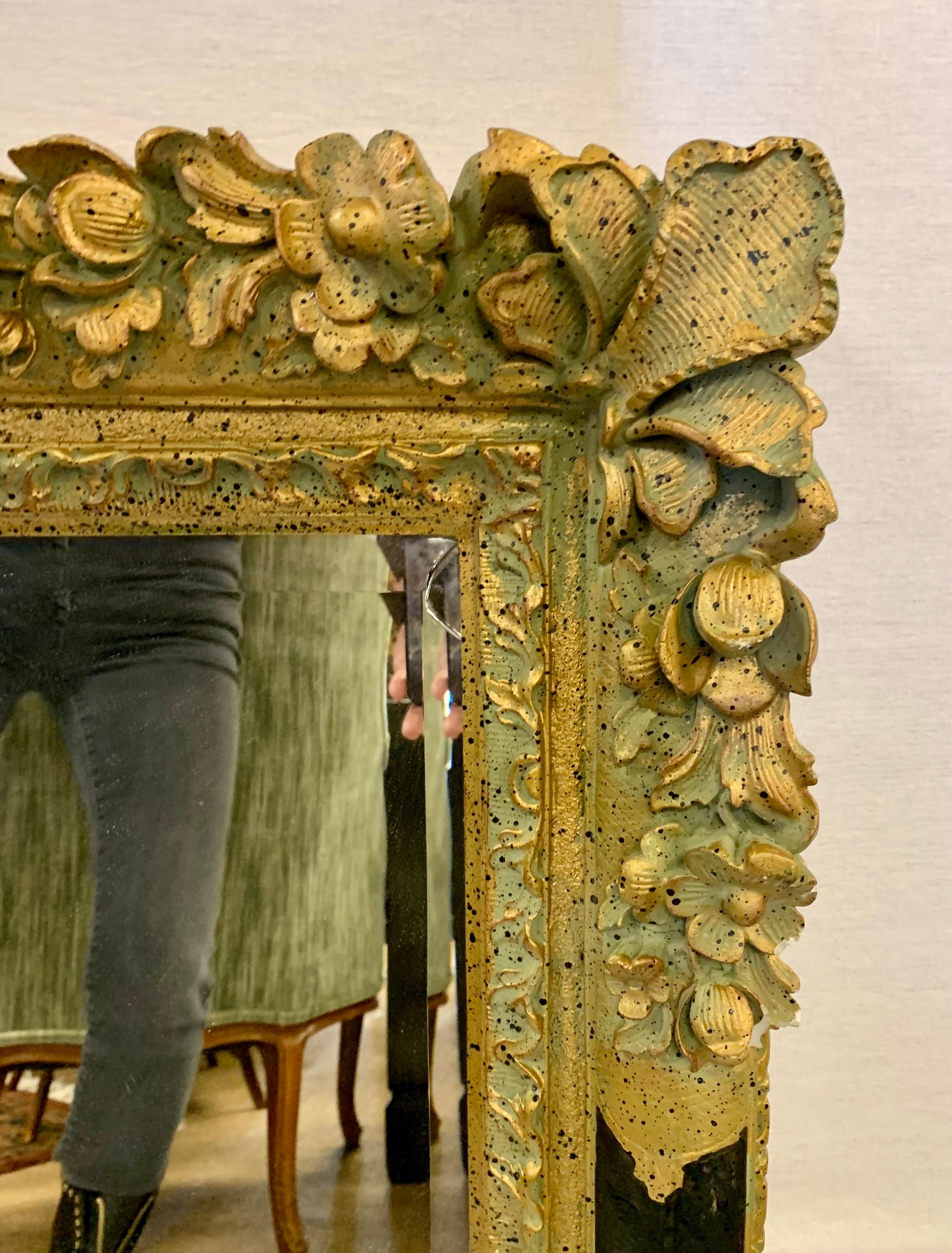 Italian Heavily Carved Neoclassical Ornate Gilt Giltwood and Black Mirror For Sale
