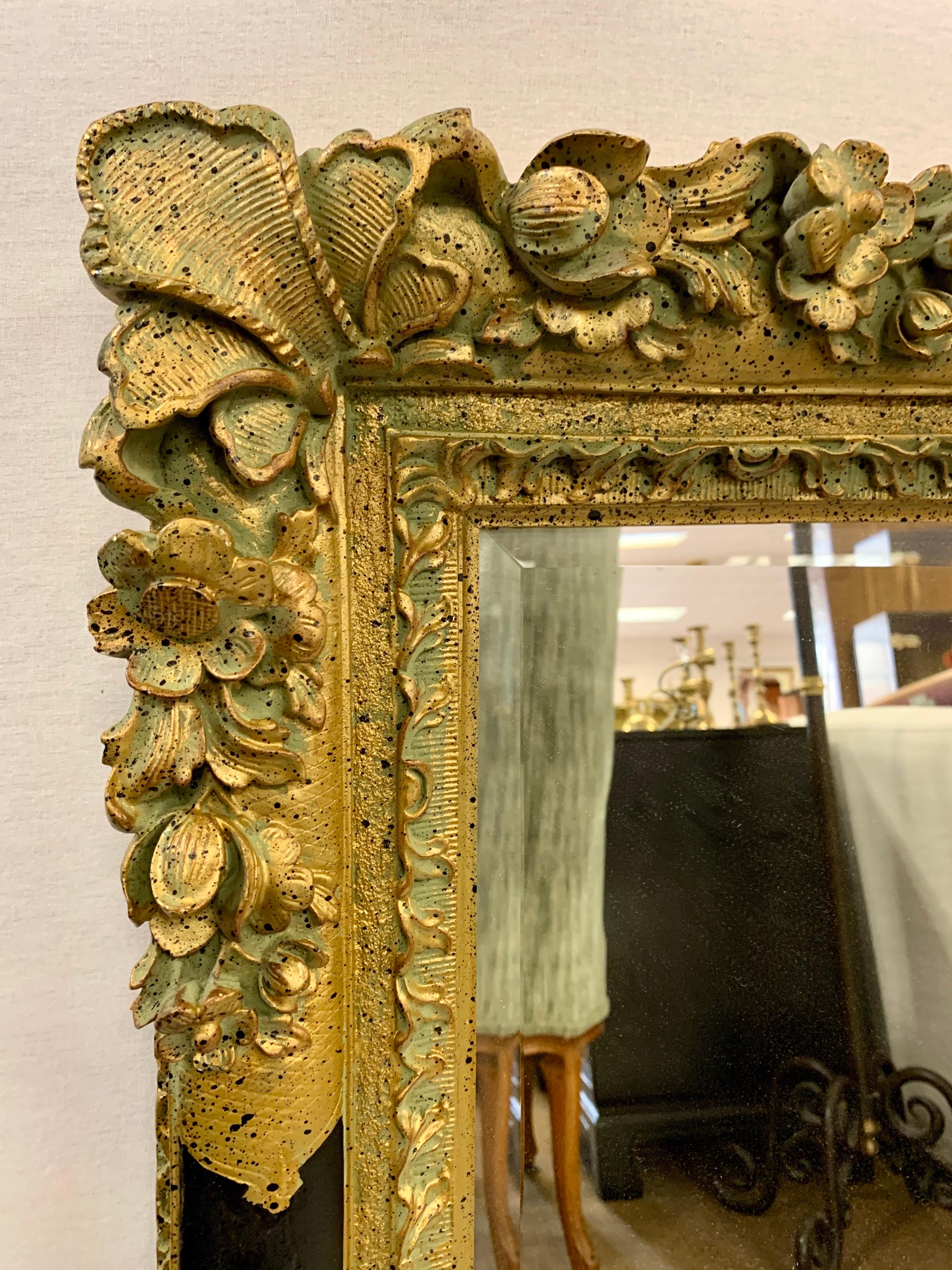 Mid-20th Century Heavily Carved Neoclassical Ornate Gilt Giltwood and Black Mirror For Sale