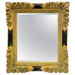 Heavily Carved Neoclassical Ornate Gilt Giltwood and Black Mirror