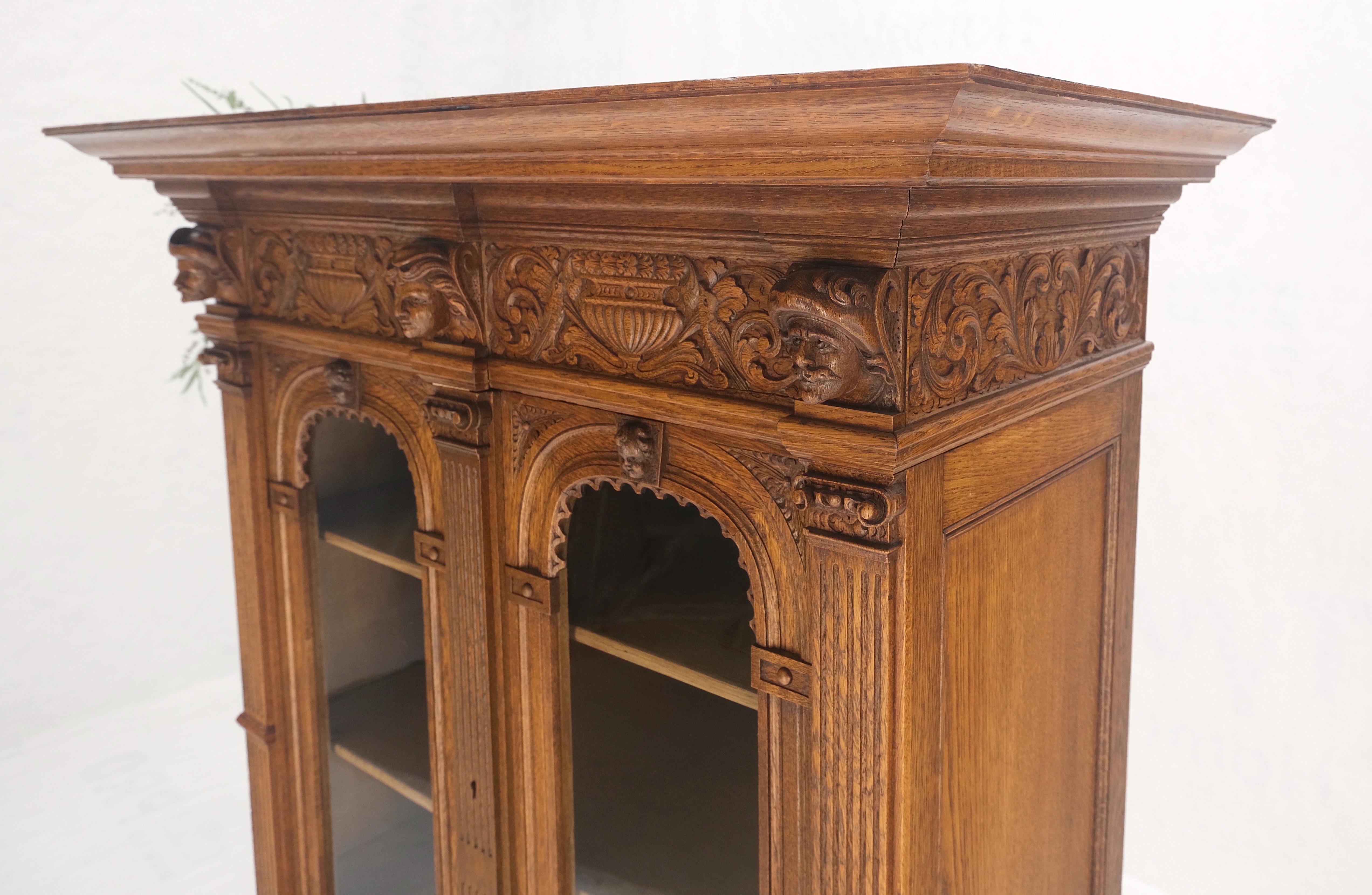Heavily Carved Oak Faces Urns Motive Two Door China Cabinet c1880s MINT! For Sale 4