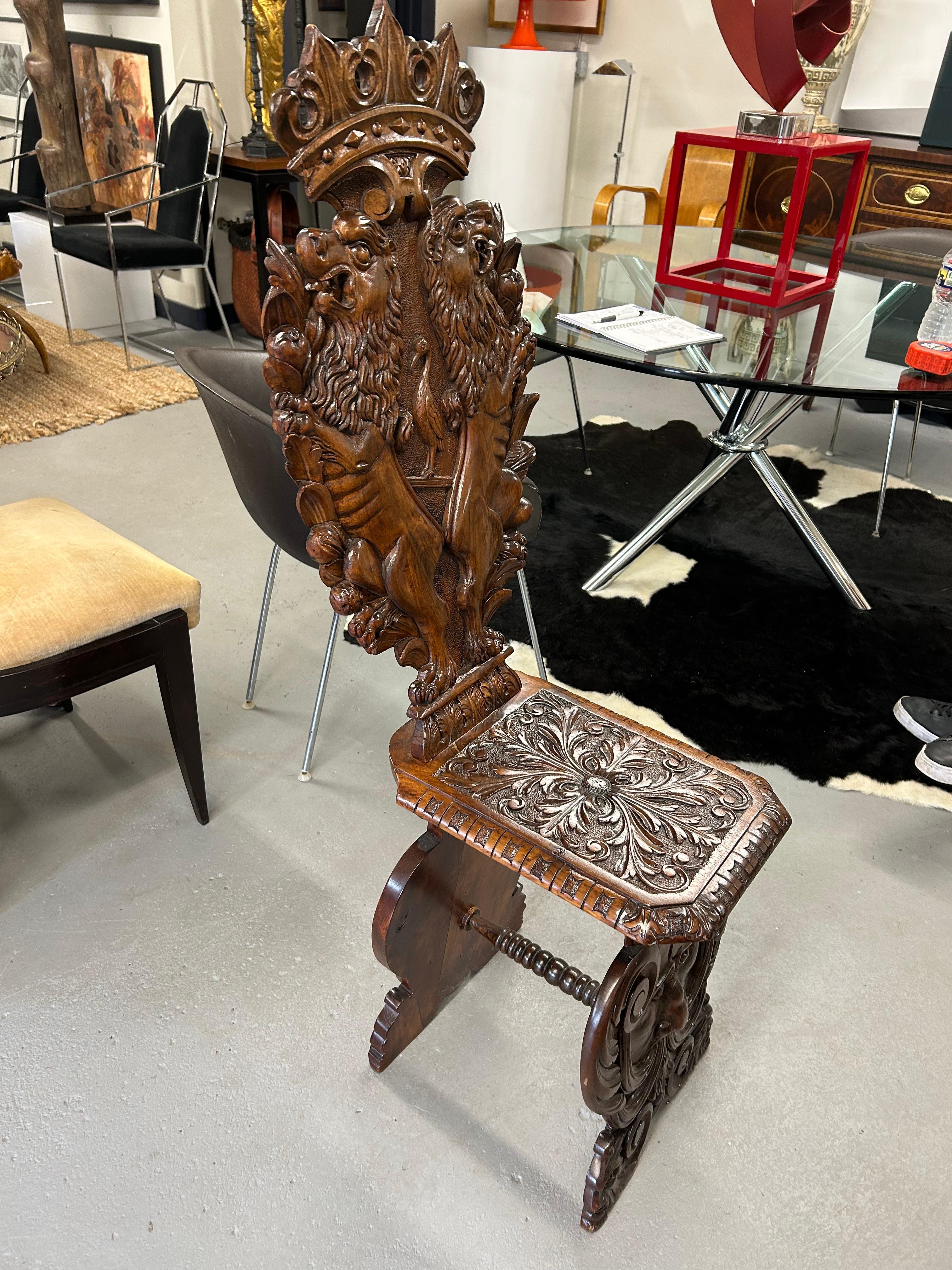19th Century Heavily Carved Walnut Sgabello Hall Chair with Lions For Sale