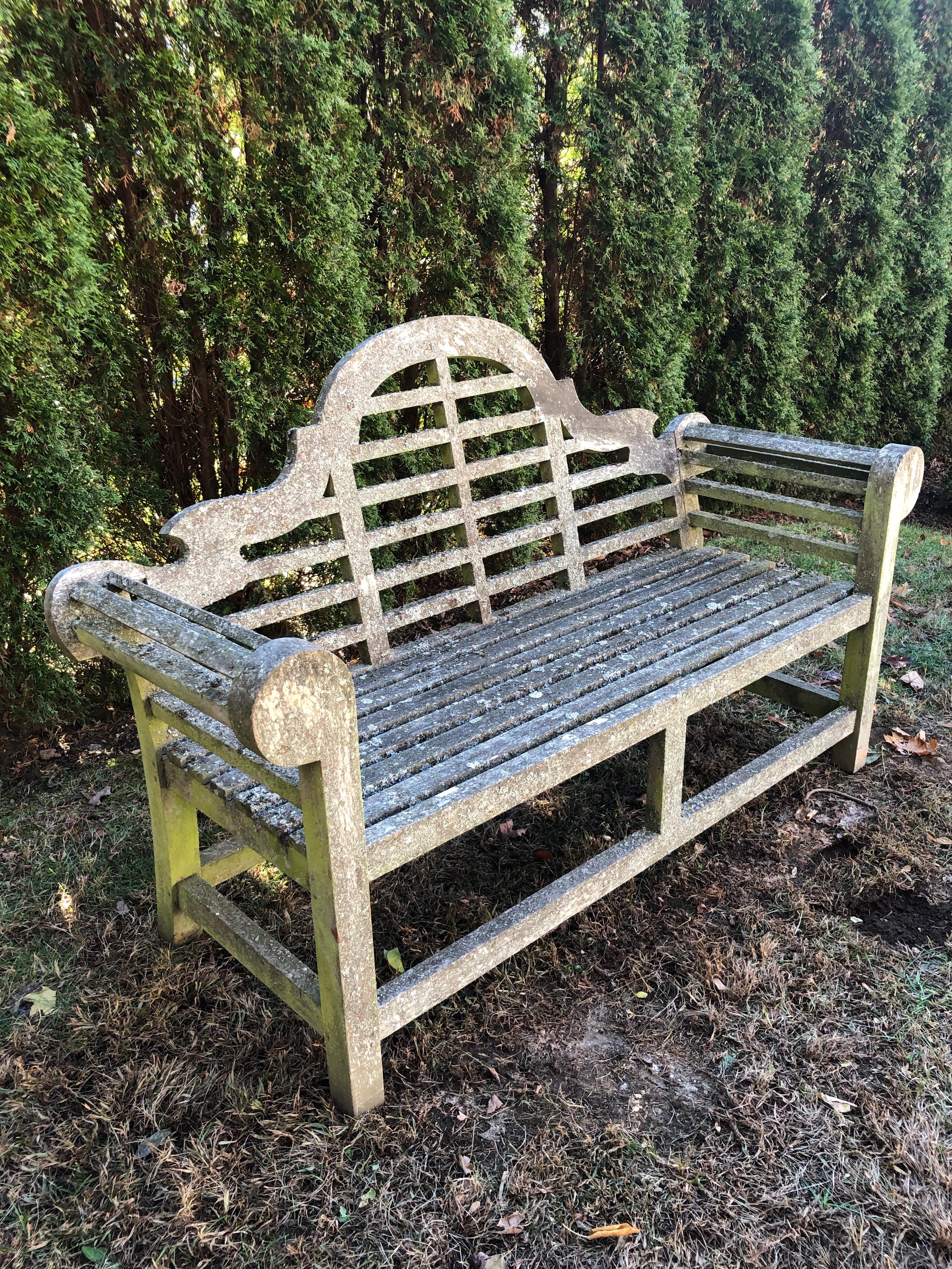 The surface on this iconic bench, originally designed by Sir Edwin Lutyens in the early 20th century, is simply divine! Loaded with lichen, and in overall very good condition, it has had two older reinforcing repairs to the backside of both corners